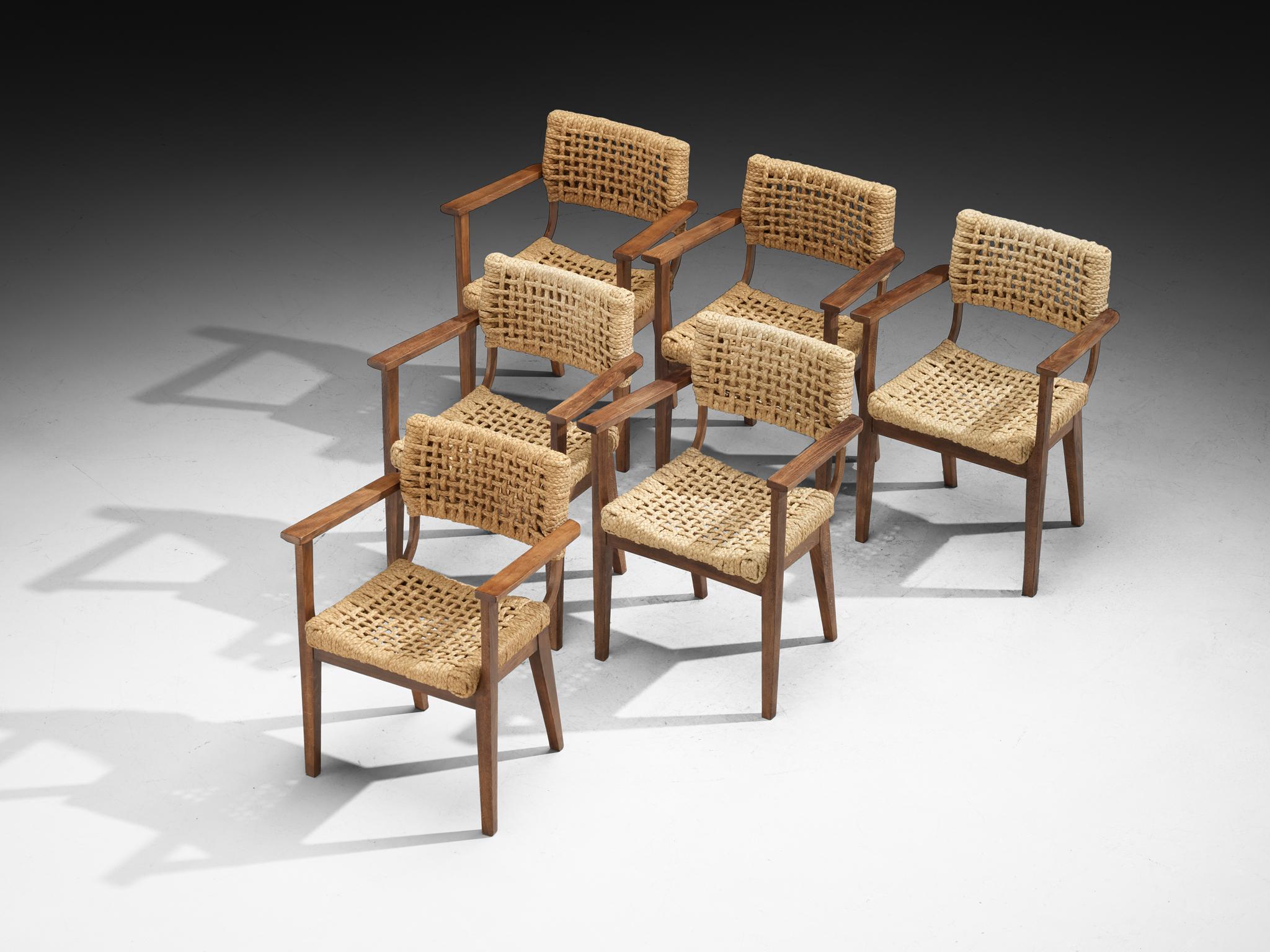 Adrien Audoux & Frida Minet for Vibo Vesoul, set of six armchairs, stained beech, straw, France, 1950s

Set of six armchairs designed by the duo Adrien Audoux and Frida Minet. The seating and backrest are made of woven hemp from the abaca plant