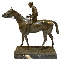 Antique Adrian Jones, A Patinated Bronze Figure of Fred Archer on Ormonde