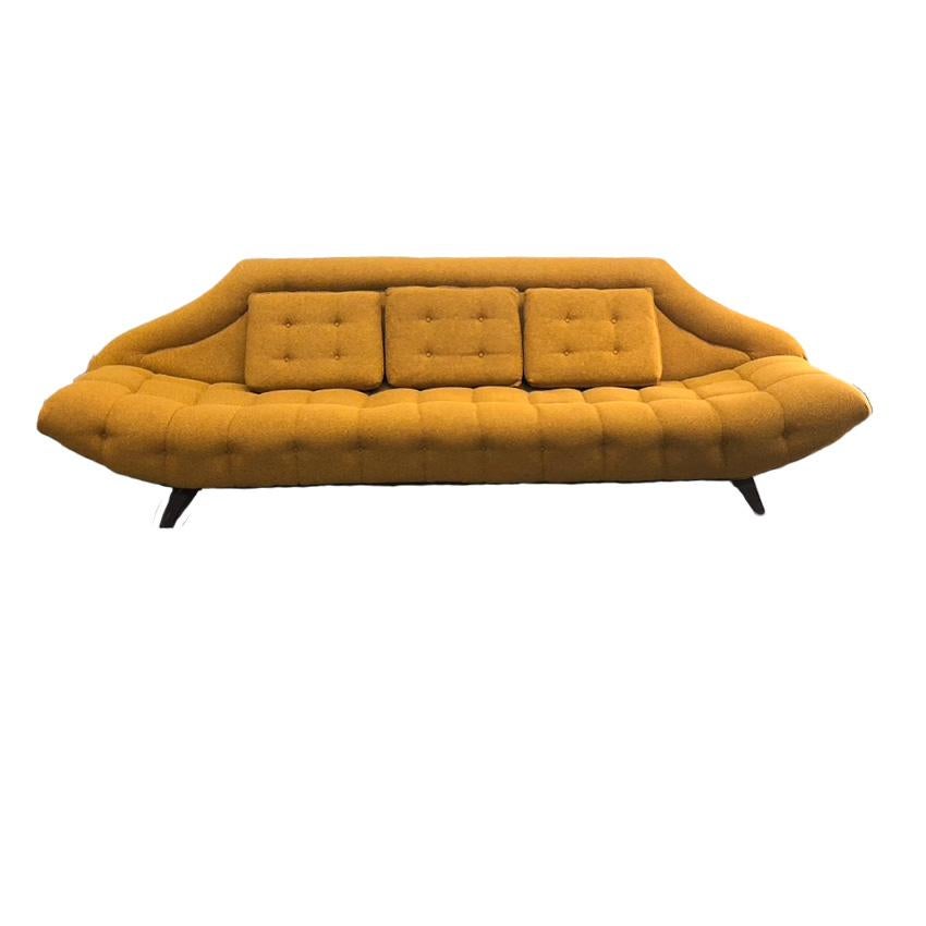 Beautiful and rare Mid-Century Modern Adrian Pearsall for Craft Associates Gondola sofa with walnut legs and mustard yellow upholstery. The tweeted yellow fabric is in great condition and can be used as is. The sofa has only had one owner and has