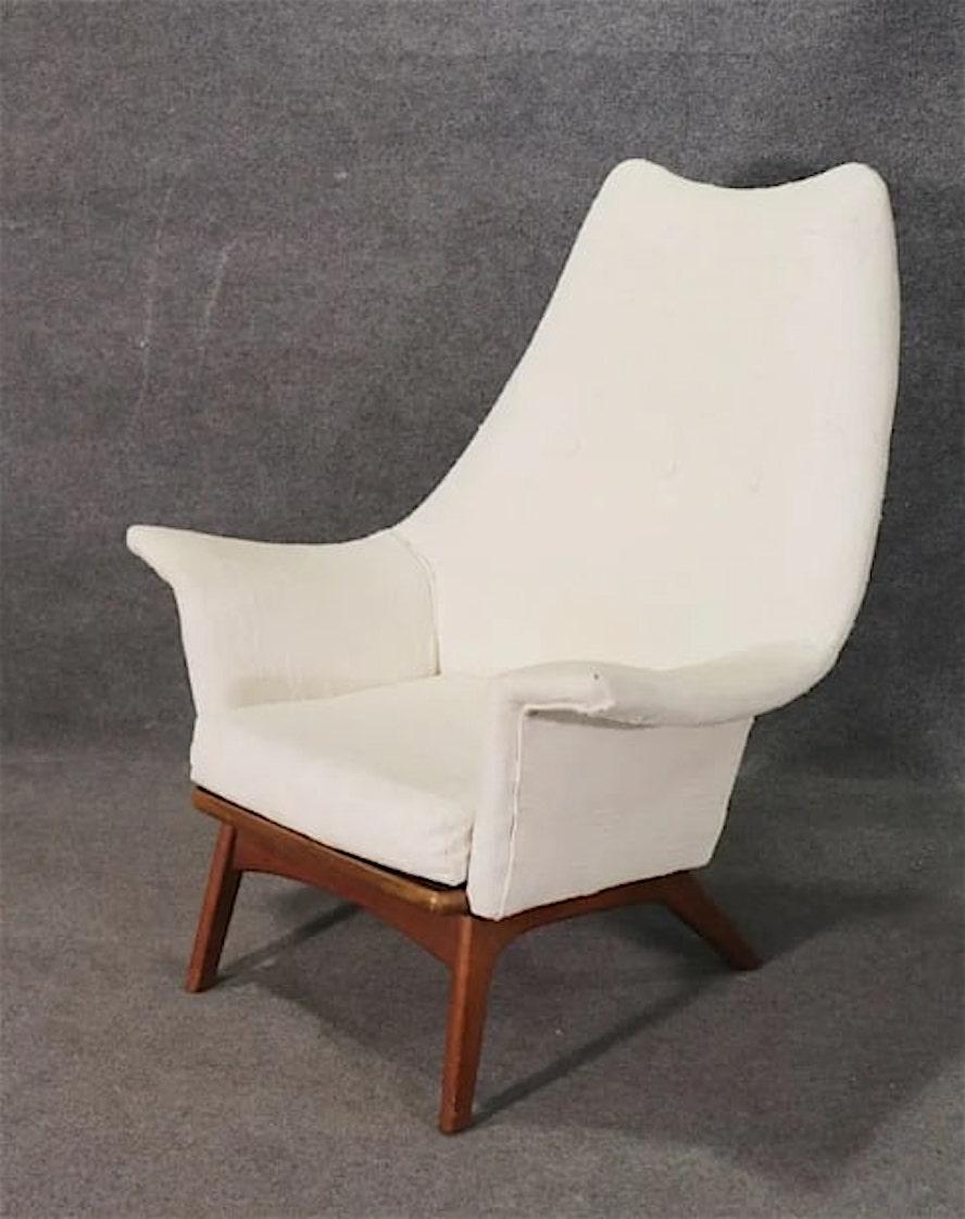 Iconic mid-century modern tall back lounge chair with 