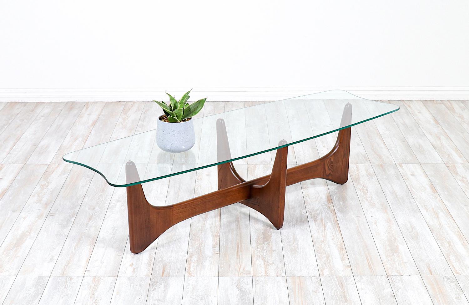 2399-TC sculpted Coffee table designed by Adrian Pearsall for Craft Associates in the United States circa 1960’s. Designed by one of the most iconic American designers, this coffee table is perfect for home or office due to its sculptural walnut