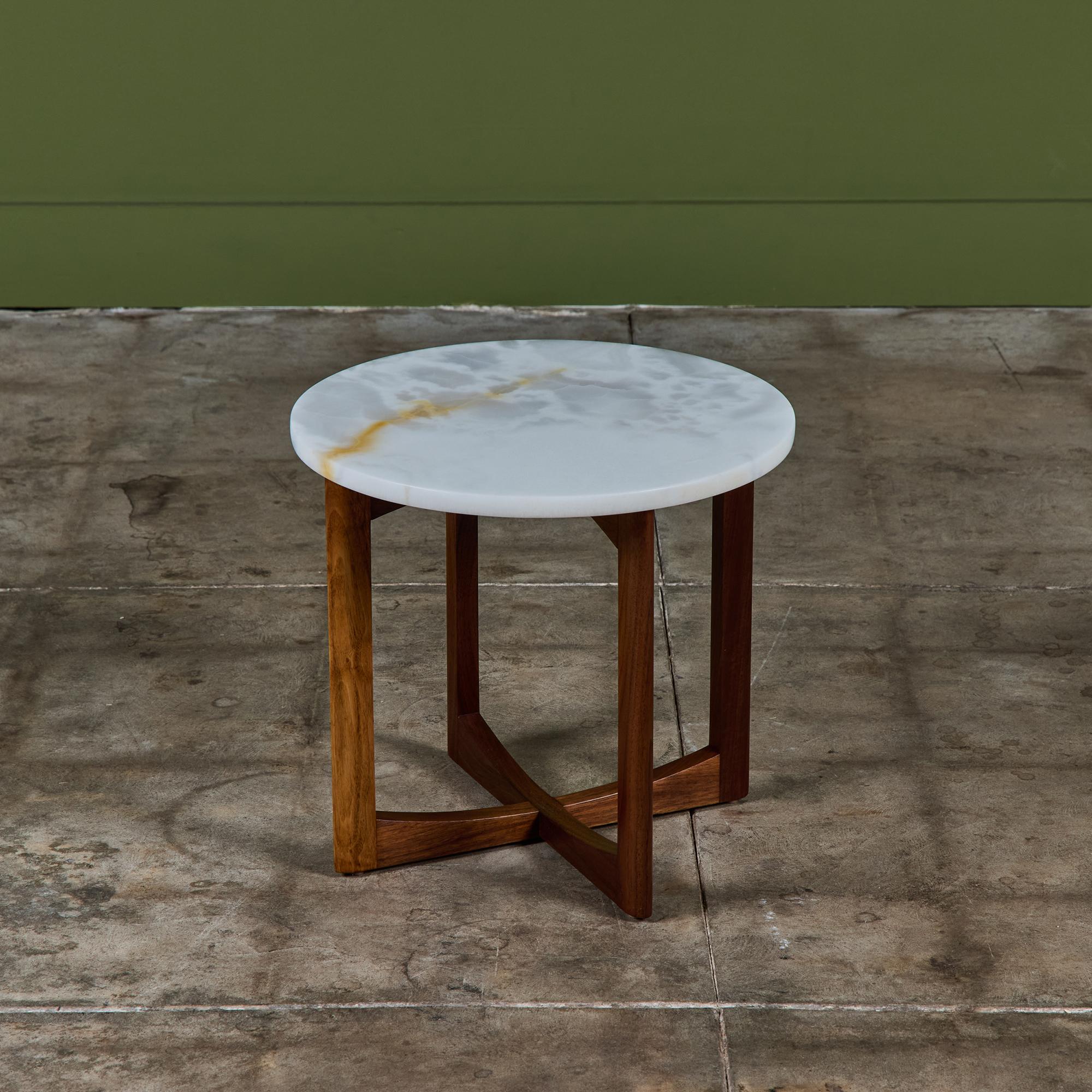 Adrian Pearsall for Craft Associates c.1960s, USA. This side table features a round alabaster table top and beautifully refinished walnut base. The combination of the two elements makes for a striking design.

Dimensions
18
