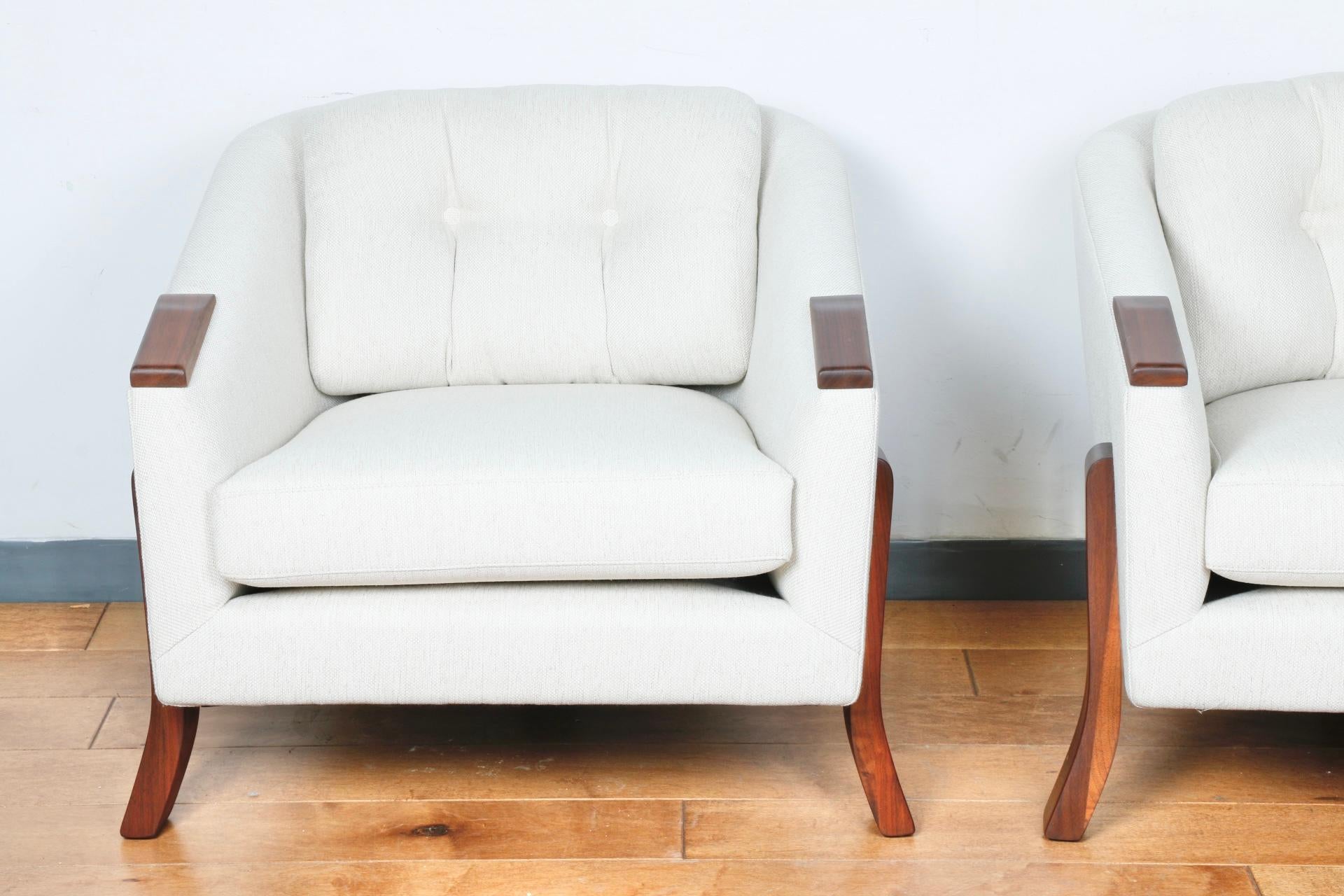 Beautiful reupholstered and refinished pair of lounge chairs. Great vintage style fabric in excellent condition. They have beautiful bases that make them stand out. 
Super comfortable and chill. 

