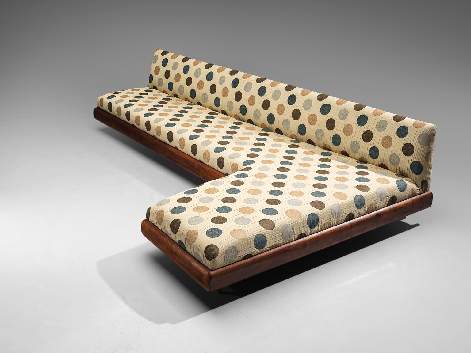 Adrian Pearsall 'Boomerang' sofa with polka dot upholstery and walnut, United States, 1960s. 

This boomerang sofa has a modern shape and sinuous lines which create a comfortable and appealing look. The sofa is a great addition to a living area or