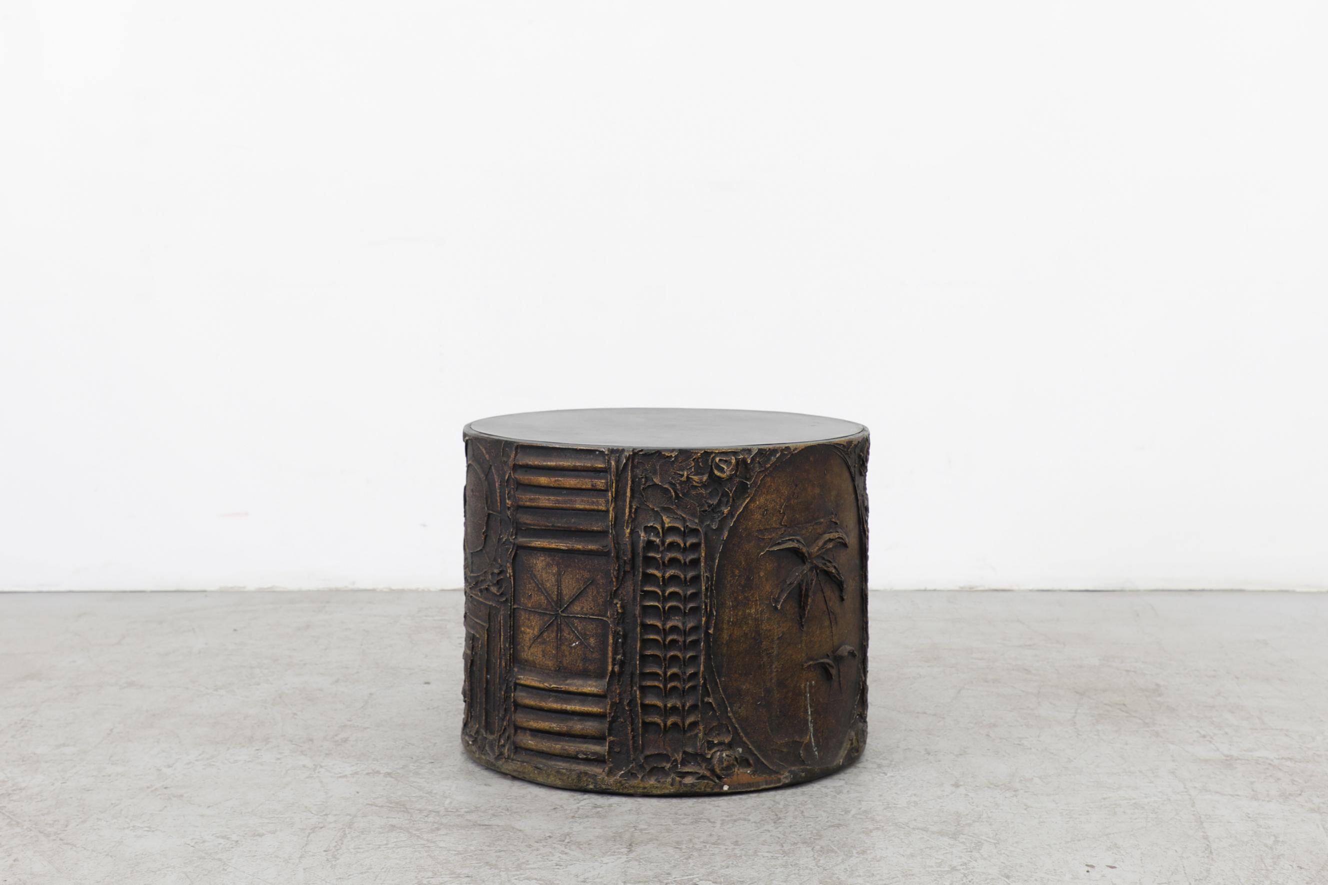 Architect-turned-furniture-designer Adrian Pearsall sculpted brutalist drum table with a black laminate top and cast resin decorative relief frame. Designed in the early half of the 1970s for his label 