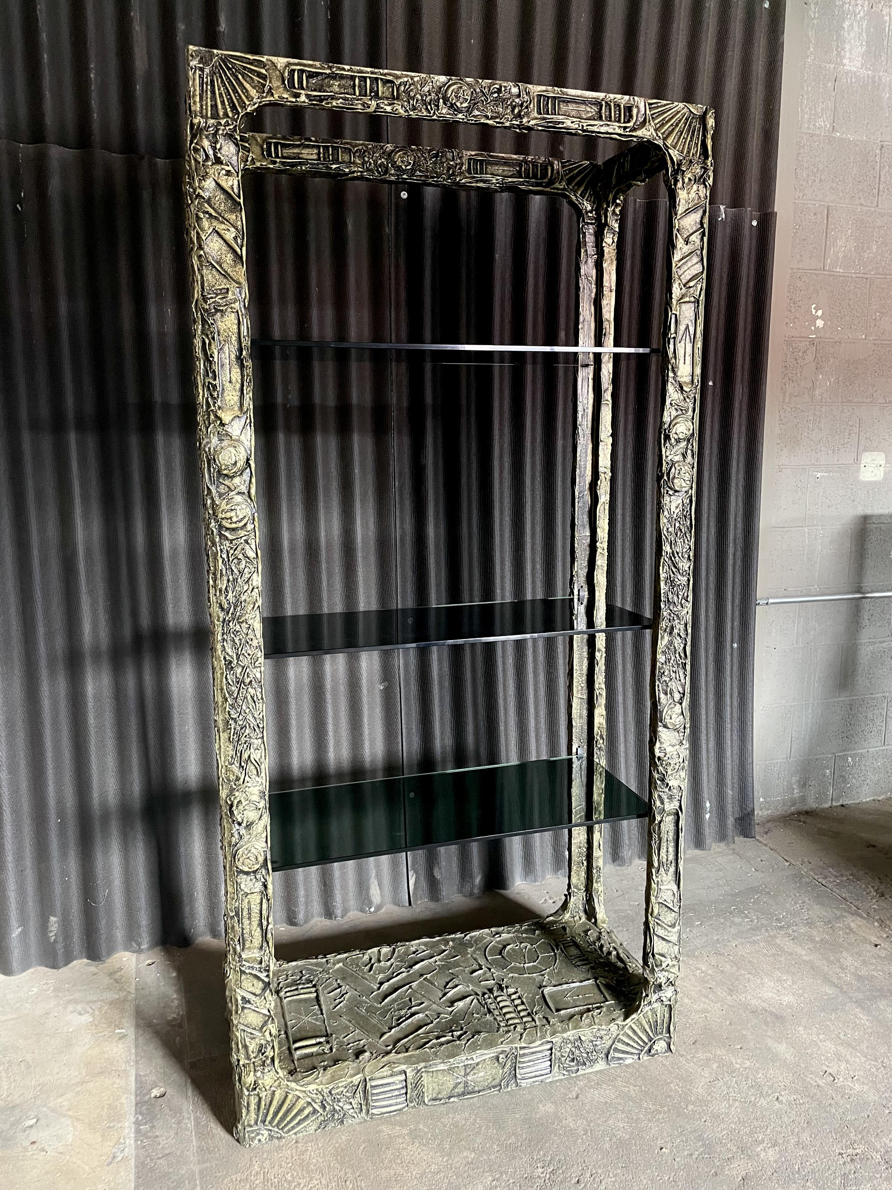 Gorgeous Etagere by Designer, Adrian Pearsall.
This particular Etagere is in wonderful condition with no broken pieces.

The resin is intact and is stunning.
The glass is original and the grey tint perfectly highlights the resin.

Unit is strong and