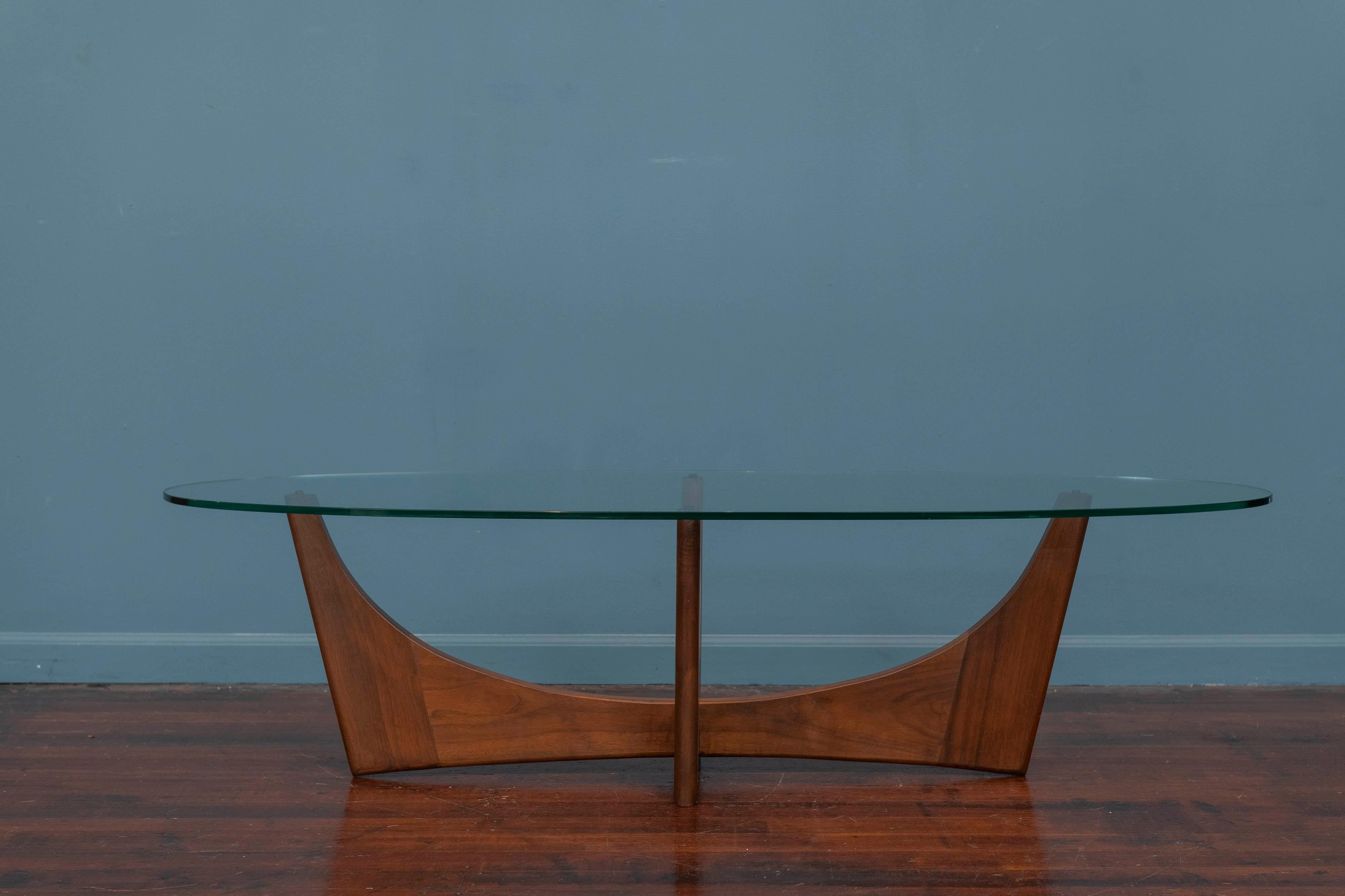 Adrian Pearsall design coffee table in walnut with an oval glass top.