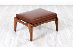 Otomana de cuero coñac y nogal esculpido Adrian Pearsall para Craft Associates