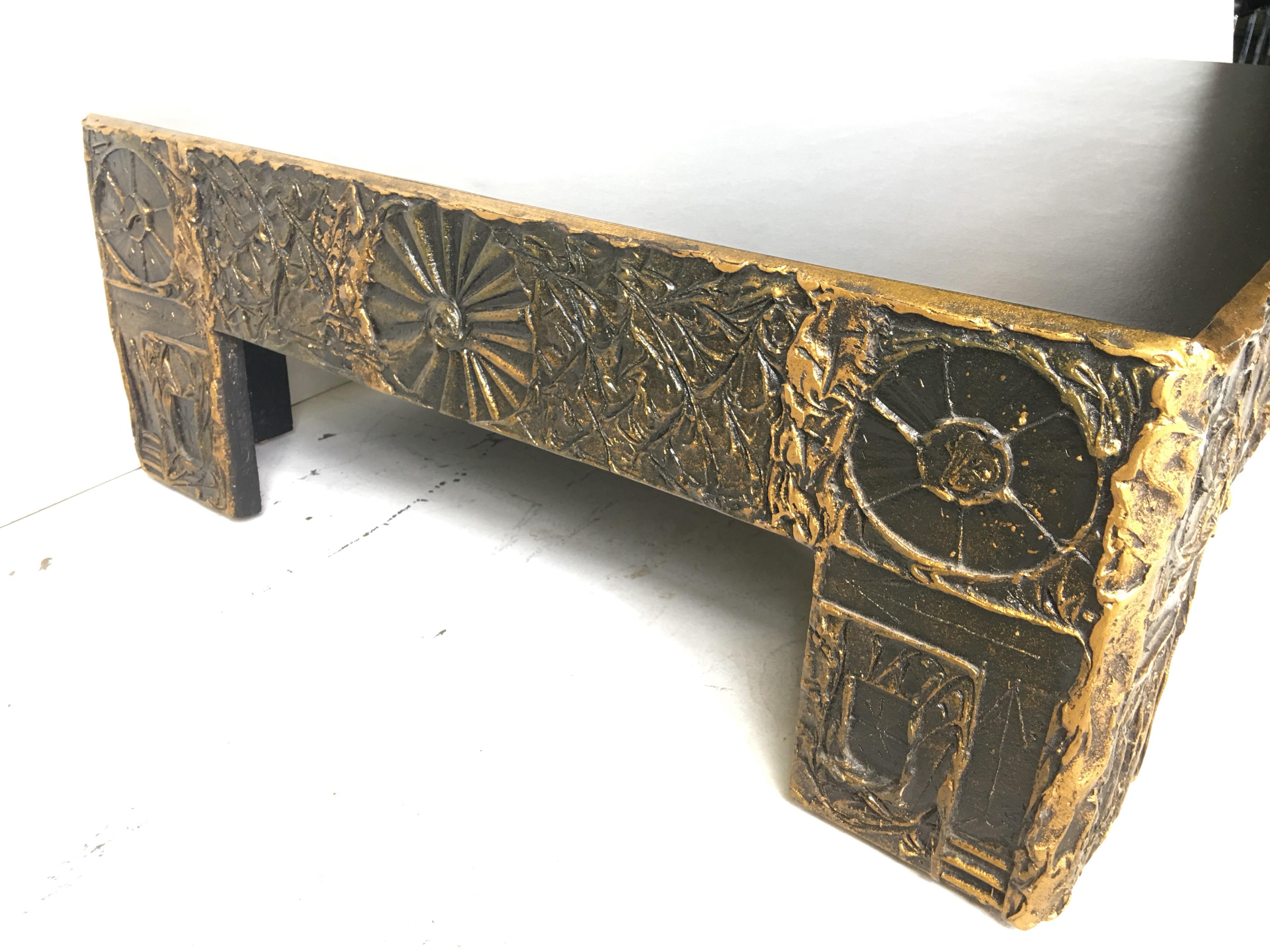 Absolutely fantastic low and large, cocktail table by Adrian Pearsall for Craft Assoc. It is from circa 1970, in beautiful condition. The brutalist sculpted resin sides and legs are in black and gold all orig. from factory.