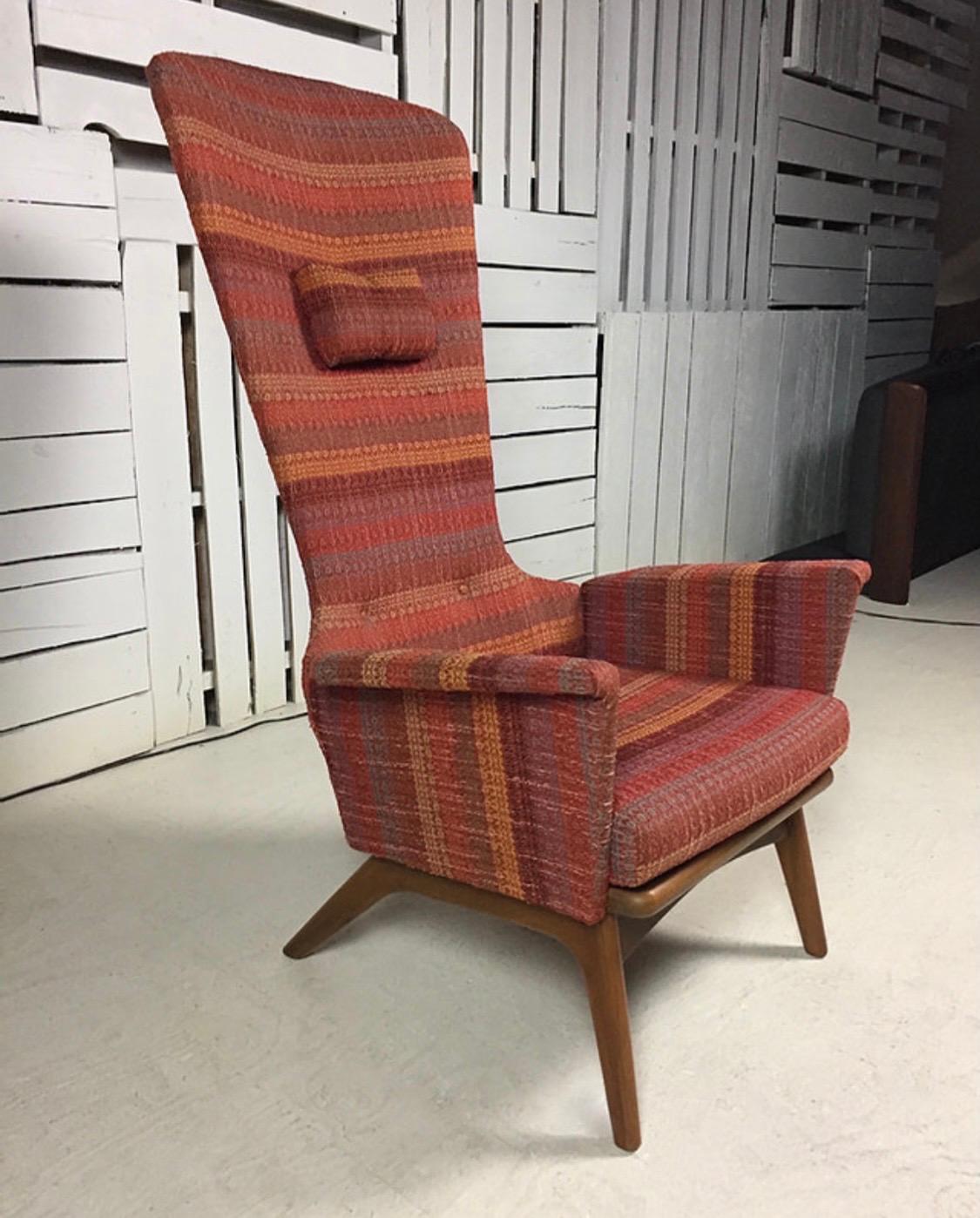 Iconic Pearsall chair, all original and still in magnificent shape, model 1534-C. The upholstery features a multi-stripe fabric that is still in great shape. There is a headrest at top. Now more than ever, home is where the heart is.