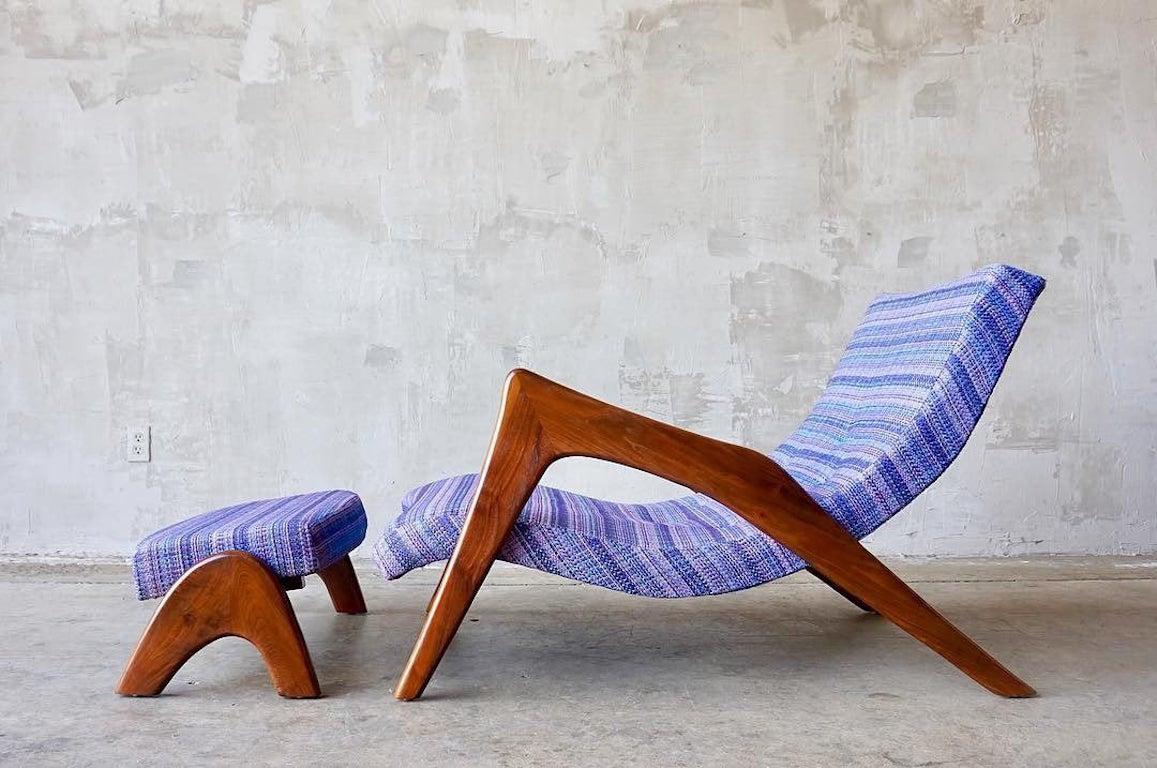 Rare ‘crescent' (or often referred to as 'grasshopper') lounge chair with matching ottoman, designed by Adrian Pearsall for Craft Associates, circa 1960s. 

Original woven fabric in various shades of purple and blue is in excellent condition. Foam