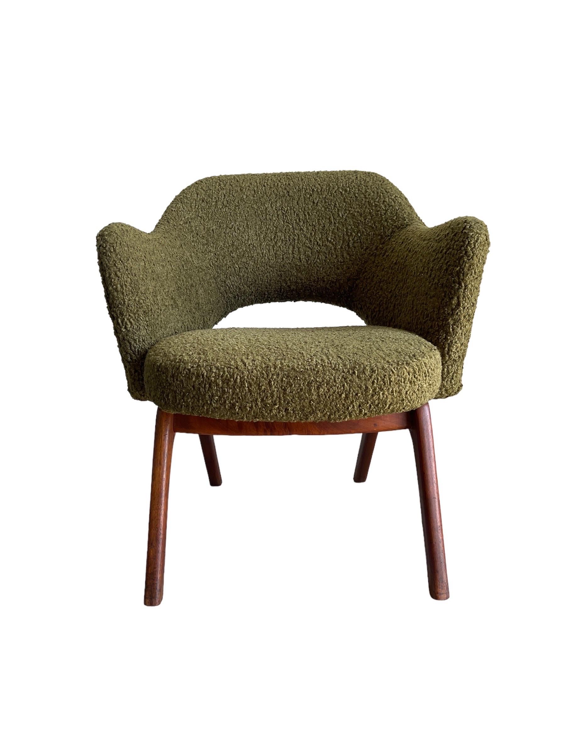 Experience the epitome of mid-century modern design with this Adrian Pearsall-designed chair for Craft Associates. This piece has been meticulously restored and reupholstered with plush olive green sheepskin bouclé, offering both supreme comfort and