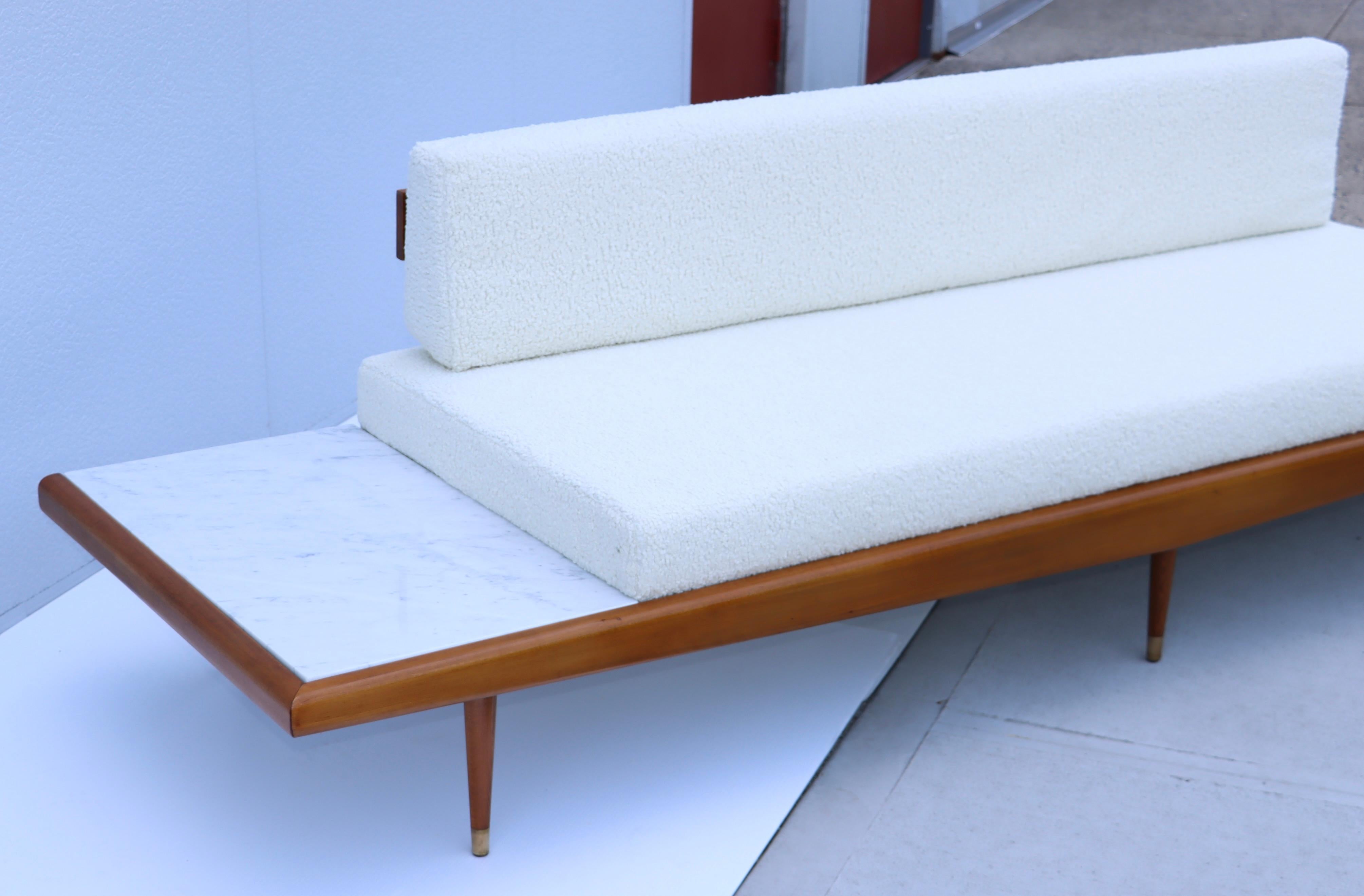 Stunning 1960's Mid-Century Modern beech wood frame floating sofa with Carrara marble end tables and Bouclé upholstery cushions designed Adrian Pearsall for Craft Associates, lightly restored with minor wear and patina to the wood.