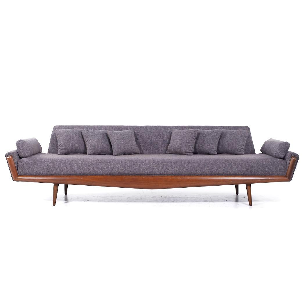 Adrian Pearsall for Craft Associates 2000-S Mid Century Walnut Gondola Sofa

This sofa measures: 110 wide x 32 deep x 30 inches high, with a seat height of 18 and arm height of 20.5 inches

All pieces of furniture can be had in what we call restored