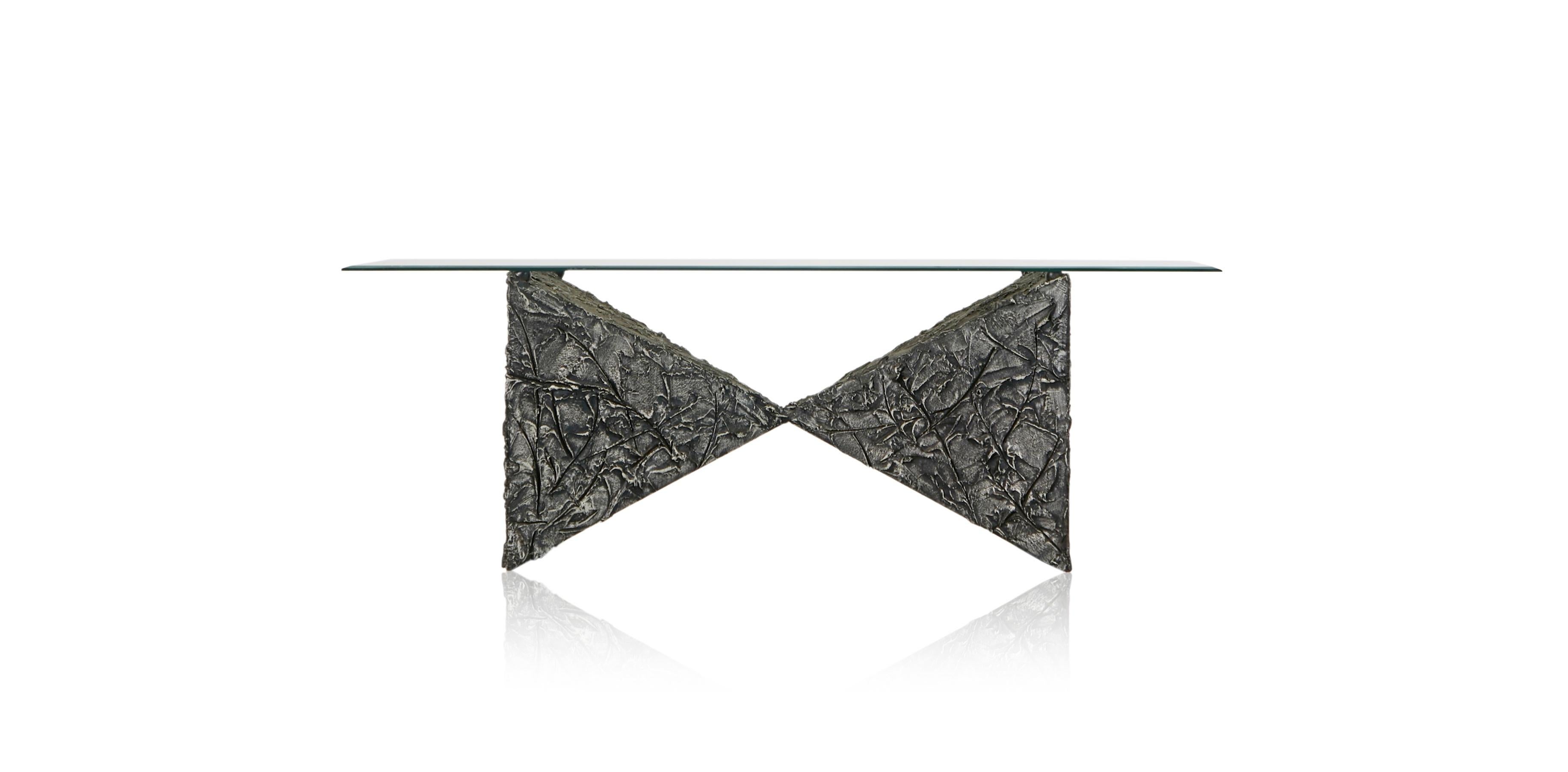 Brutalist coffee table by Adrian Pearsall for Craft Associates. This amazingly cool looking cocktail table features a sculptural base formed of two pyramid shapes which connect together their peaks - and to the viewers amazement, is quite strong