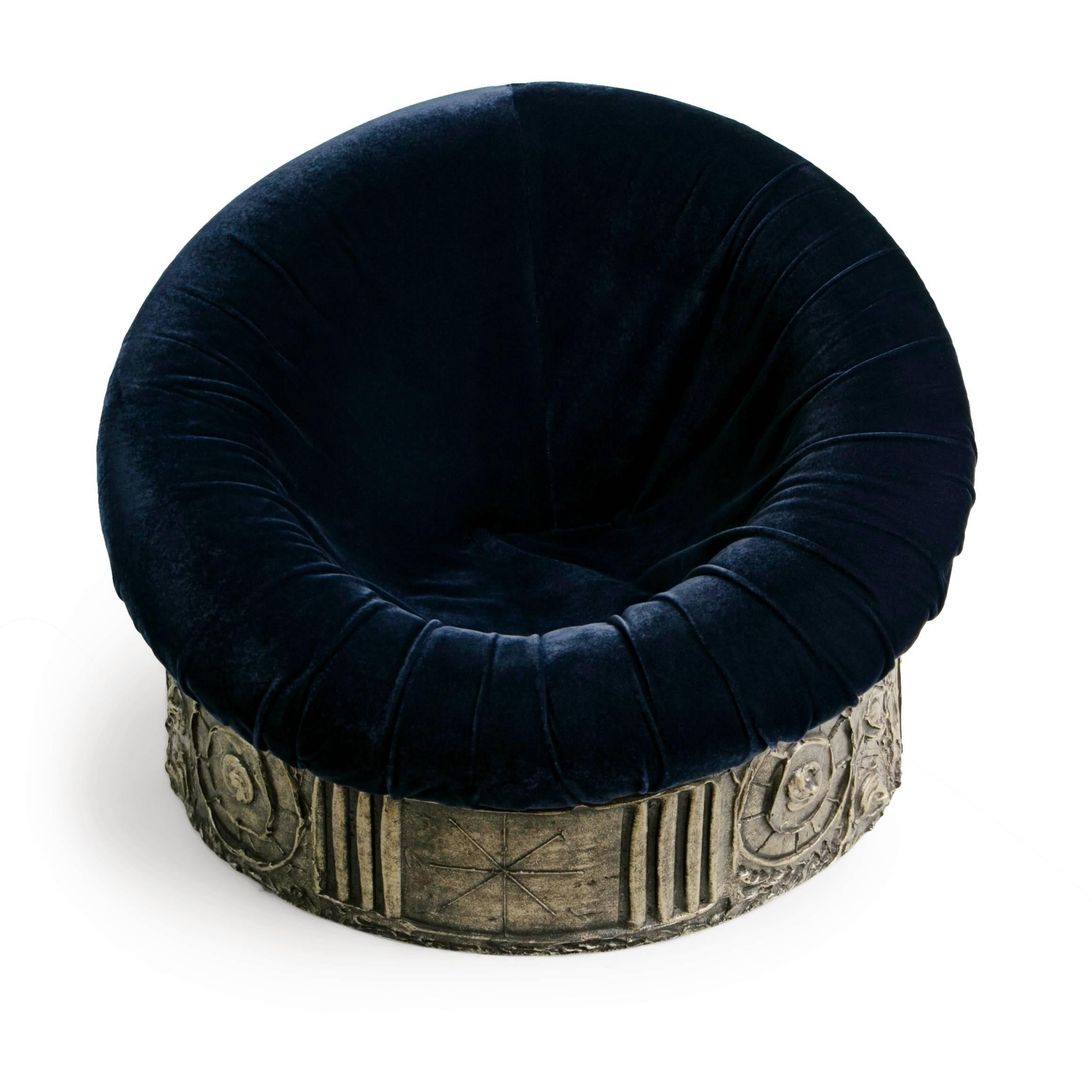 An excellent example of Adrian Pearsall's Brutalist creations for Craft Associates. This tub chair offers a deep comfortable seat upholstered in an on-trend navy velvet with ruching and button tufting, perfect for sitting back and relaxing. This