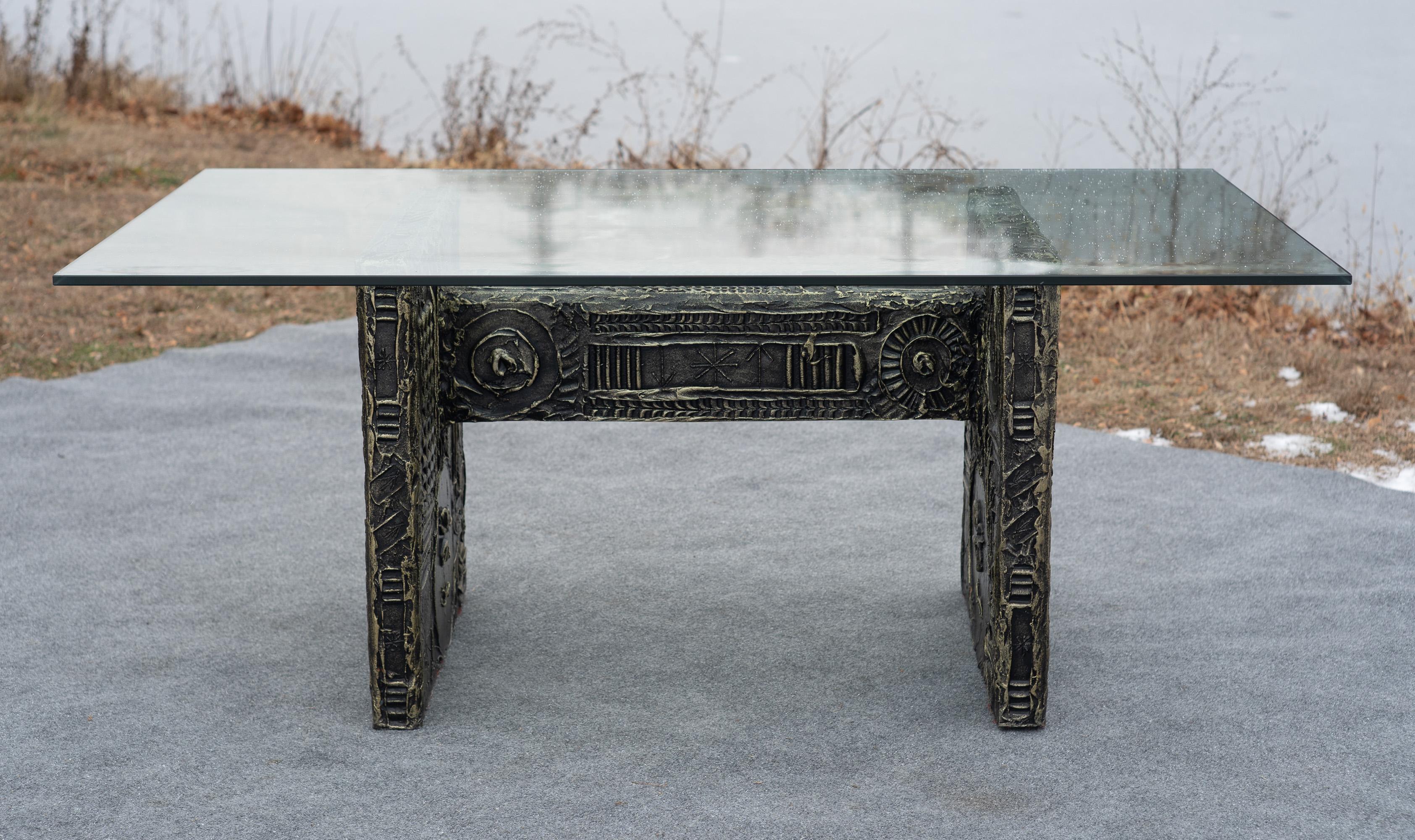 Designed in the 1960s by Adrian Pearsall, this table was manufactured by Craft Associates in the US. It features a double post style design connected by a central shaft. Every surface features something ineresting to admire. Spirals, stars, waves,
