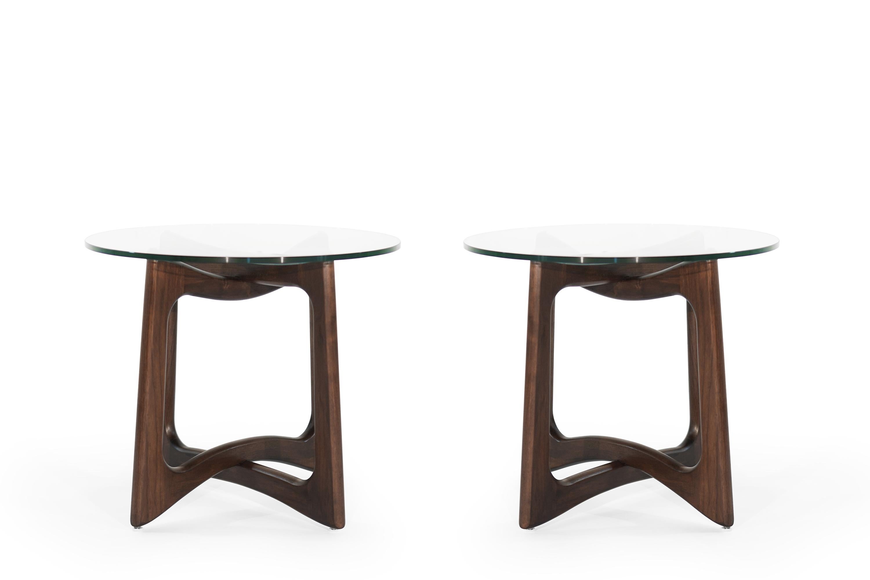 Set of fully restored sculptural walnut side tables designed by Adrian Pearsall for Craft Associates, circa 1950s. Walnut fully restored, new tempered glass tops.