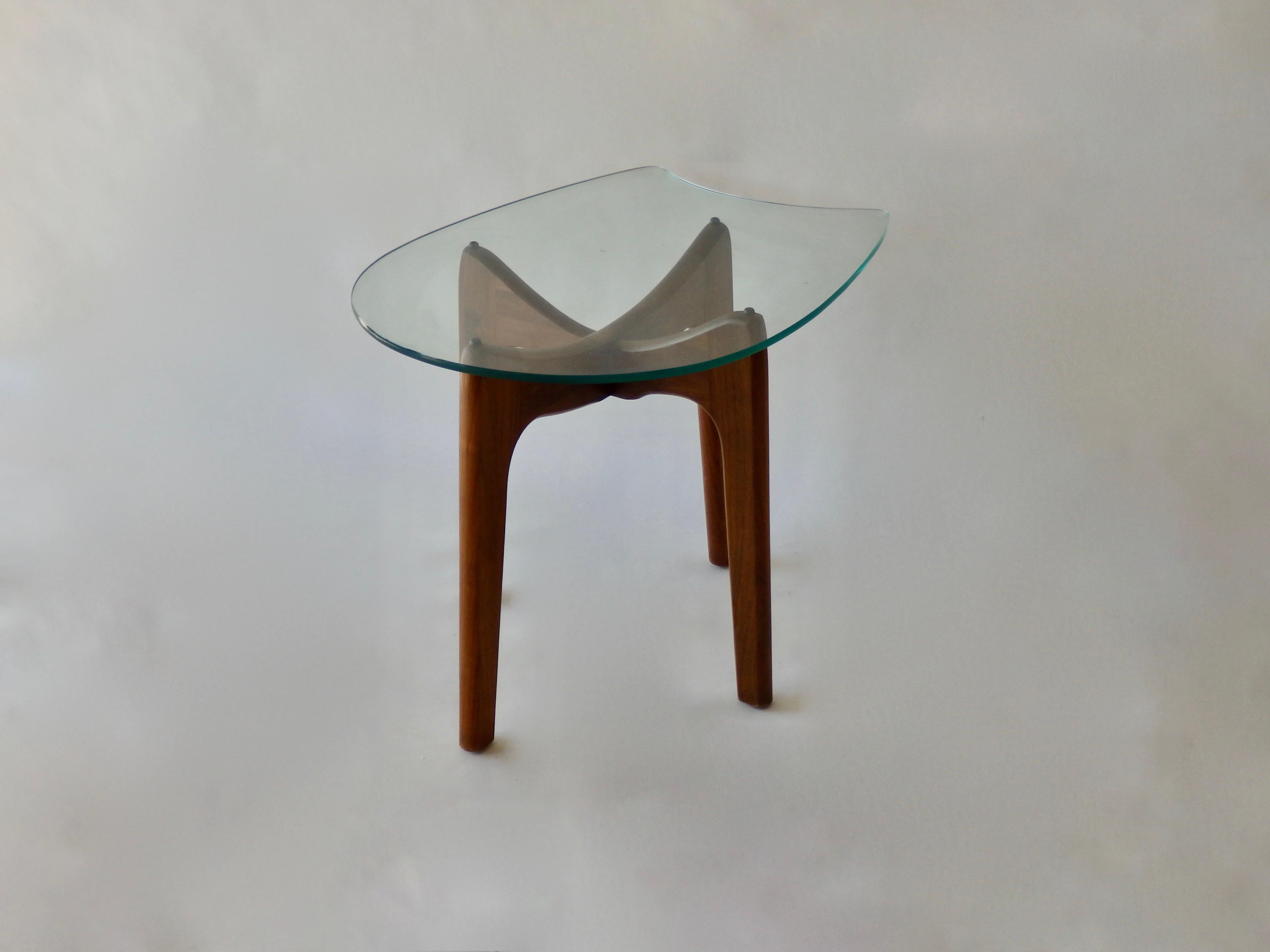 Architecturally styled walnut base holds horseshoe shaped glass top. Adrian Pearsall design for Craft Associates of Pennsylvania.