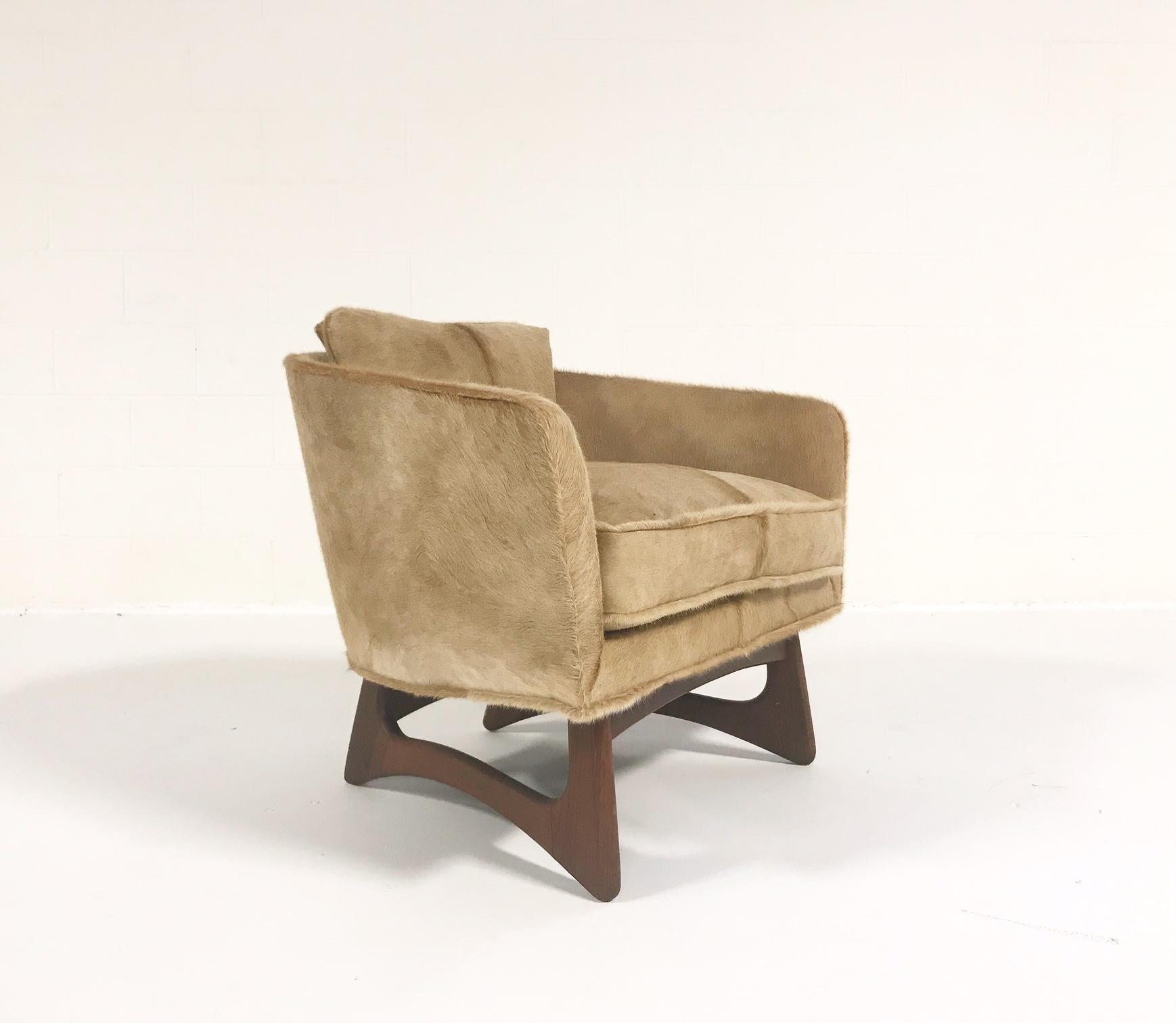 This chair is a favorite of our customers! Once we restore a vintage Adrian Pearsall lounge chair, we never seem to keep it in our showroom very long. And no wonder! The large, inviting seat, the beautiful walnut legs, the modern design. And,