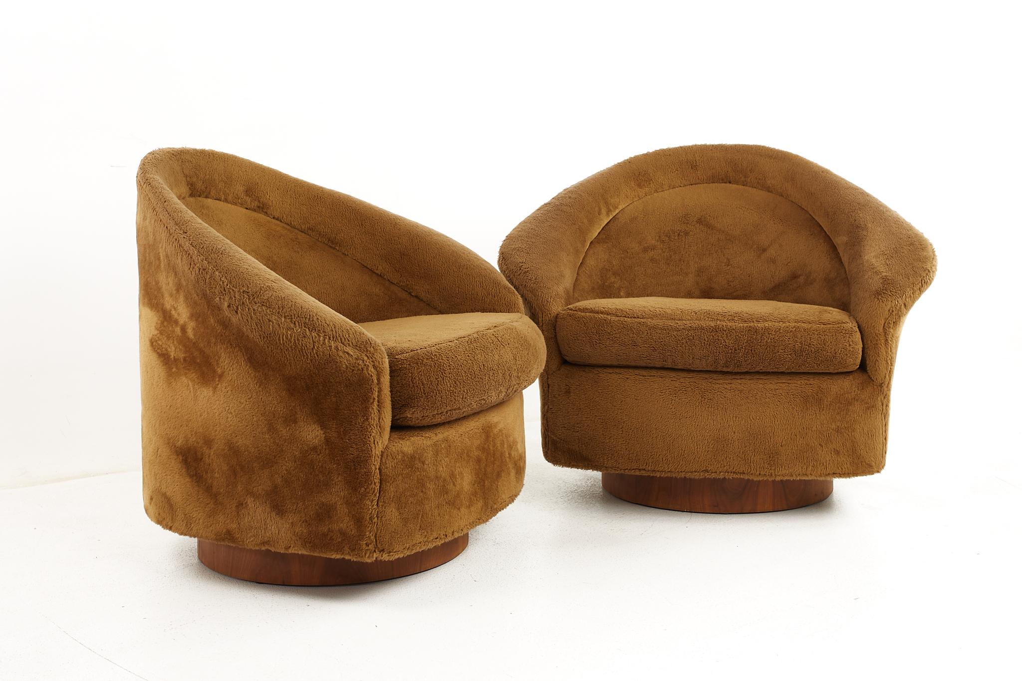 Adrian Pearsall for Craft Associates mid century swivel walnut lounge chairs - a pair

Each chair measures: 38 wide x 28 deep x 30.5 high, with a seat height of 17 and arm height of 22 inches

All pieces of furniture can be had in what we call