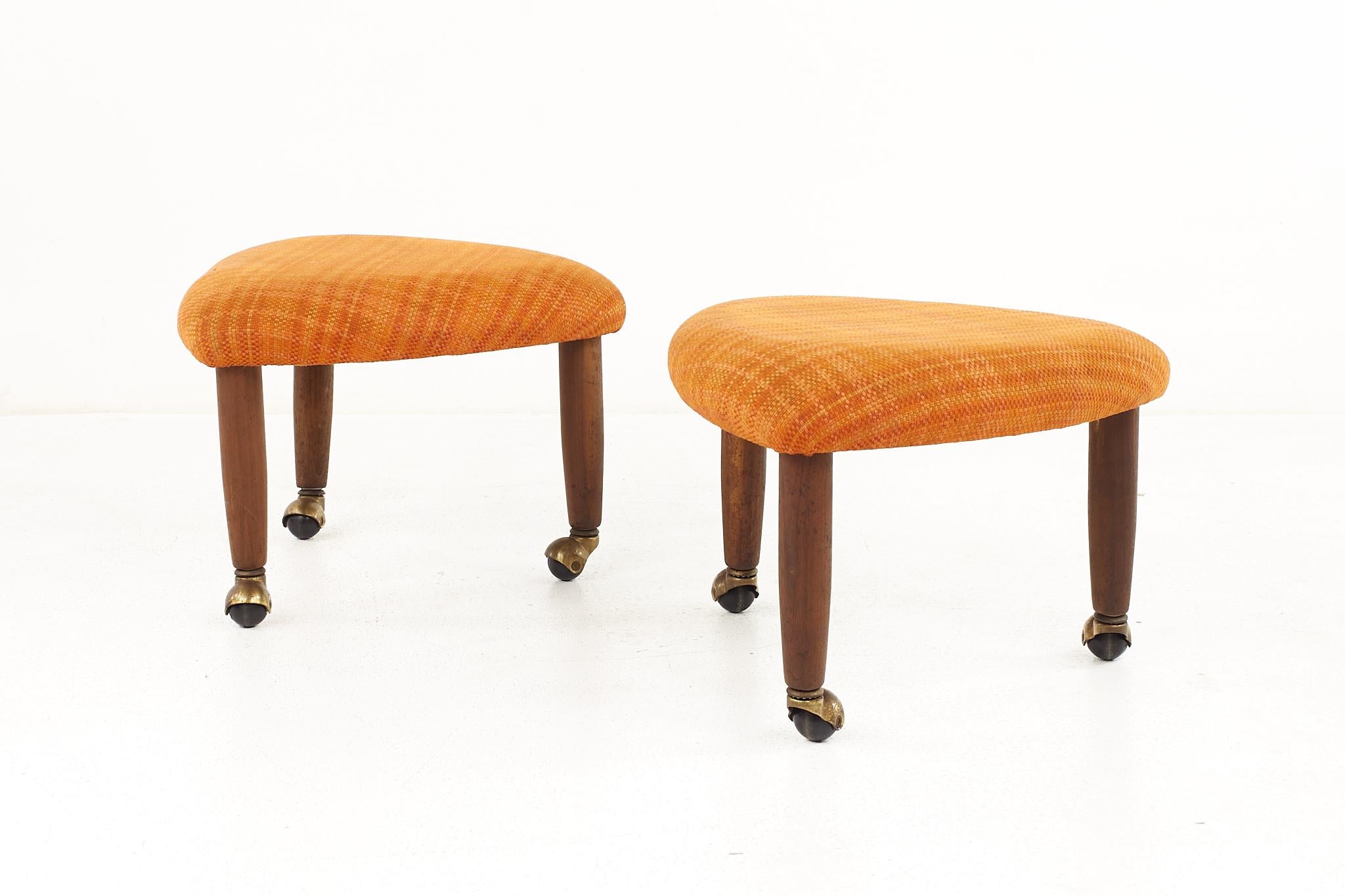 Adrian Pearsall for Craft Associates mid-century walnut ottoman on casters - a pair.

Each ottoman measures: 19 wide x 19 deep x 13.5 high, with a seat height of 13.5 inches

All pieces of furniture can be had in what we call restored vintage