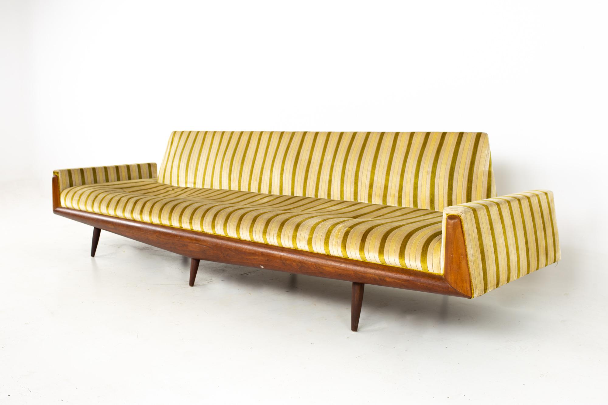 Adrian Pearsall for Craft Associates mid century extra long walnut gondola sofa
Sofa measures: 117 wide x 31 deep x 30 high, with a seat height of 20.5 inches high

All pieces of furniture can be had in what we call restored vintage condition.