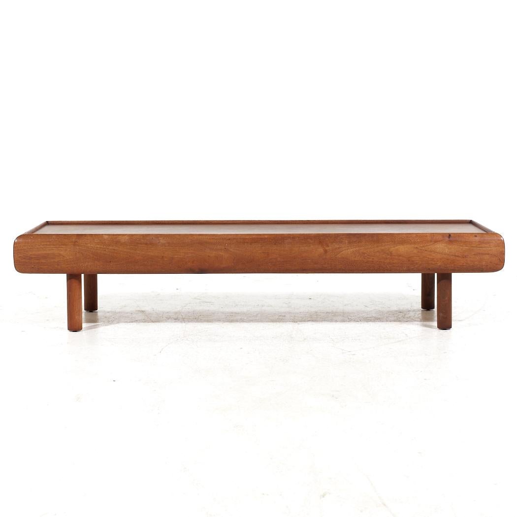 Adrian Pearsall for Craft Associates Mid Century Walnut Coffee Table

This coffee table measures: 59.75 wide x 19.75 deep x 12.25 inches high

All pieces of furniture can be had in what we call restored vintage condition. That means the piece is