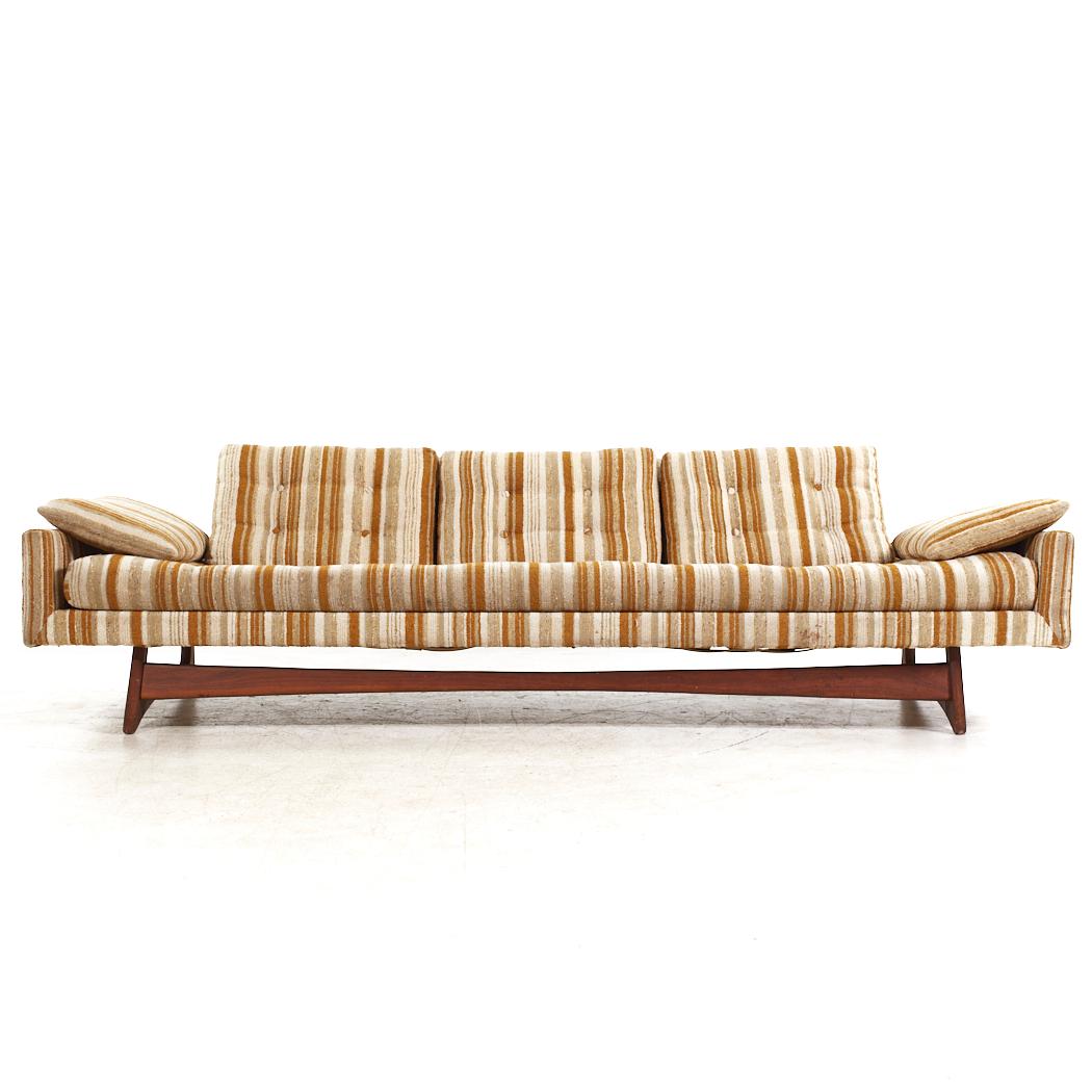 Adrian Pearsall for Craft Associates Mid Century Walnut Gondola Sofa

This sofa measures: 102 wide x 33 deep x 28.5 inches high, with a seat height of 17 and arm height of 20.5 inches

All pieces of furniture can be had in what we call restored