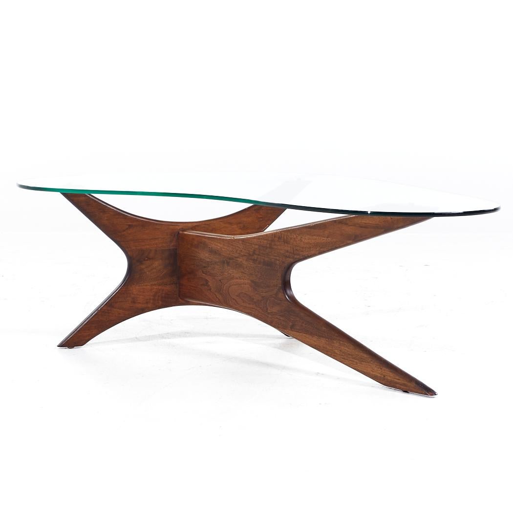 Adrian Pearsall for Craft Associates Mid Century Walnut Jacks Coffee Table

This coffee table measures: 50.5 wide x 34 deep x 16.25 inches high

All pieces of furniture can be had in what we call restored vintage condition. That means the piece is