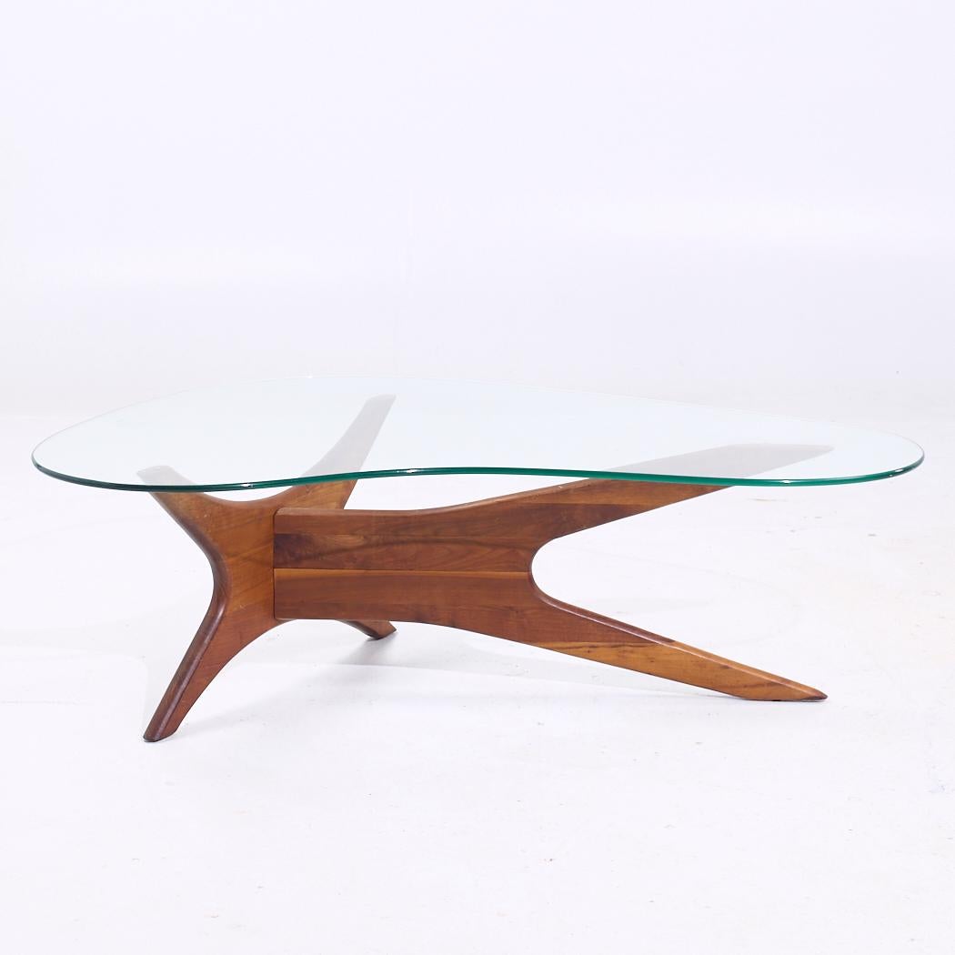 Adrian Pearsall for Craft Associates Mid Century Walnut Jacks Coffee Table

This coffee table measures: 50.5 wide x 34 deep x 16 inches high

All pieces of furniture can be had in what we call restored vintage condition. That means the piece is