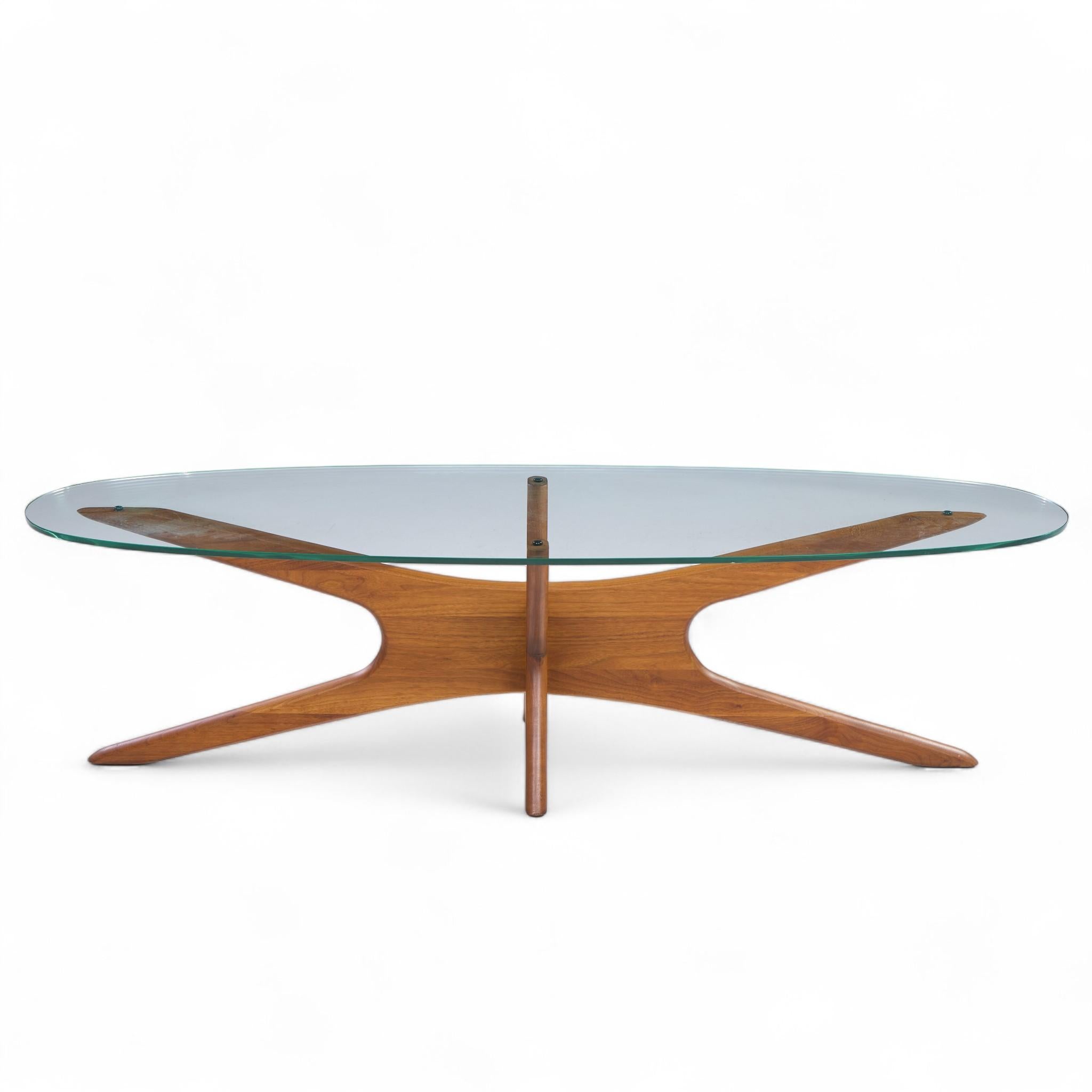 Adrian Pearsall for Craft Associates Mid Century Walnut Jacks Coffee Table

This coffee table measures: 59.25 wide x 20 deep x 15.75 inches high

Great Vintage Condition - Table Base is in Excellent Shape. Glass has a few Small Chips on Edge.