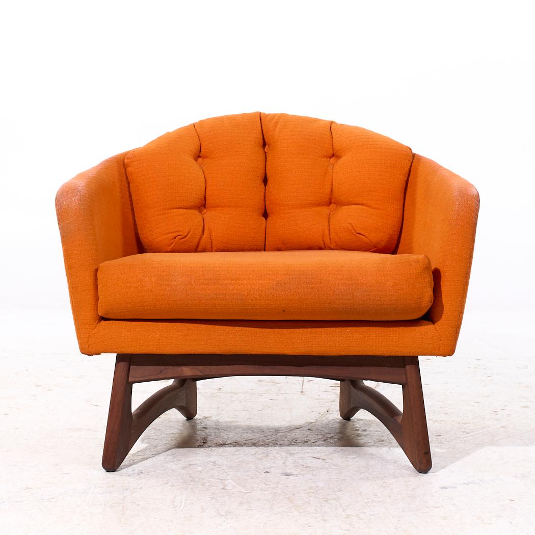Adrian Pearsall for Craft Associates Mid Century Walnut Lounge Chair

This chair measures: 35 wide x 30 deep x 29.5 high, with a seat height of 17.5 and arm height/chair clearance of 23 inches

We take our photos in a controlled lighting studio to