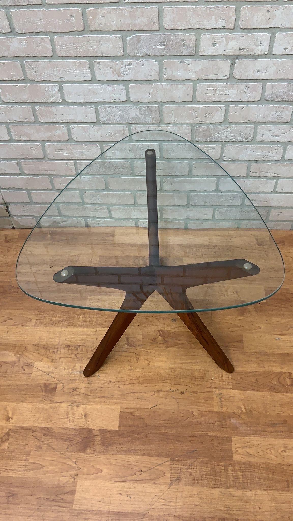 Mid Century Modern Adrian Pearsall Jacks Side Table with Triangular Glass Top Side Table

This Adrian Pearsall for Craft Associates side table is a perfect accent for your living room space. This table is hand-crafted from walnut and on top a