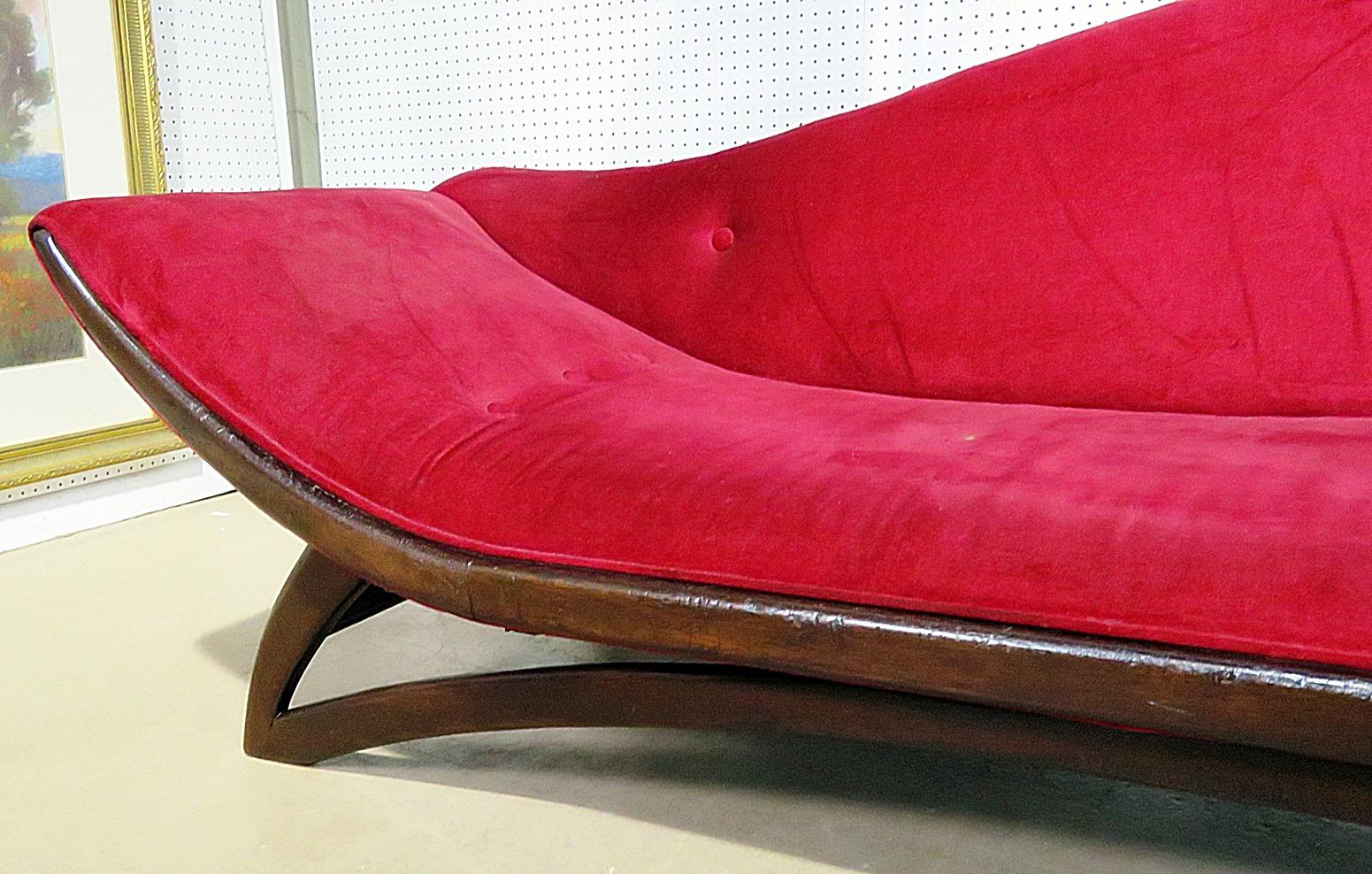 Adrian Pearsall gondola style sofa with a walnut frame.