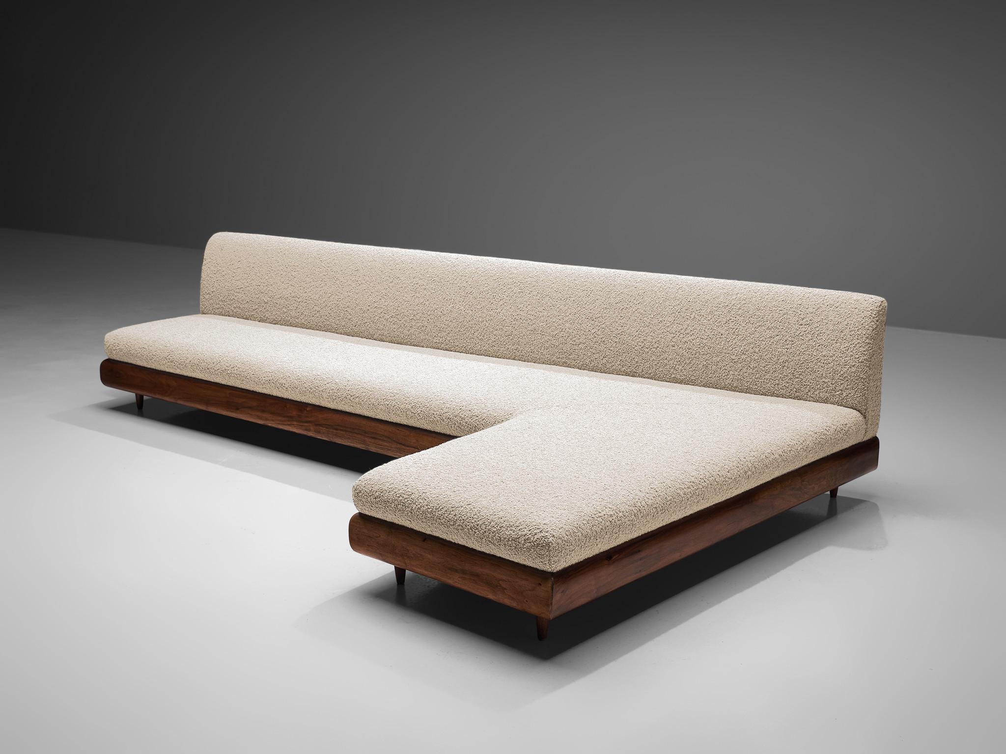 Adrian Pearsall for Craft Associates, 'Boomerang' sofa, model '1600-S', reupholstered in Pierre Frey Louison F3188001 Crème bouclé, walnut, wood, United States, 1960s

This boomerang sofa has a unique shape based on angular lines, creating a