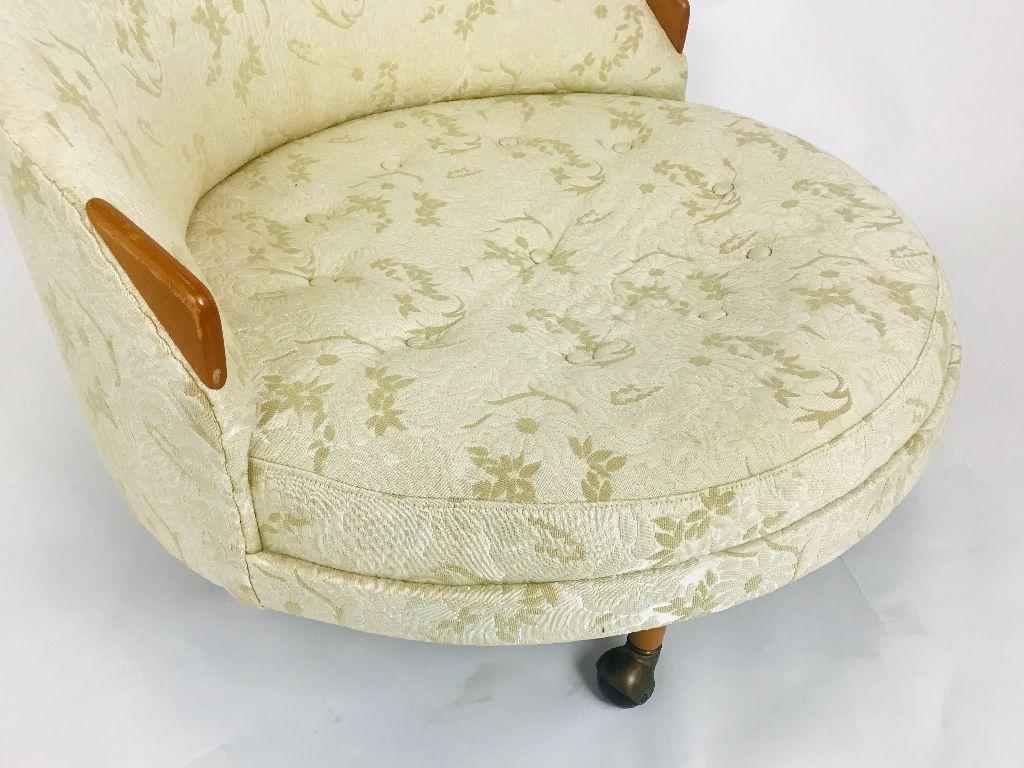 Nice example of an Adrian Pearsall Havana lounge chair in original jacquard fabric. Chair has 4 walnut legs with casters and 2 walnut arms. Fabric is all intact and actually in great condition for age. Has very light areas of discoloration on close