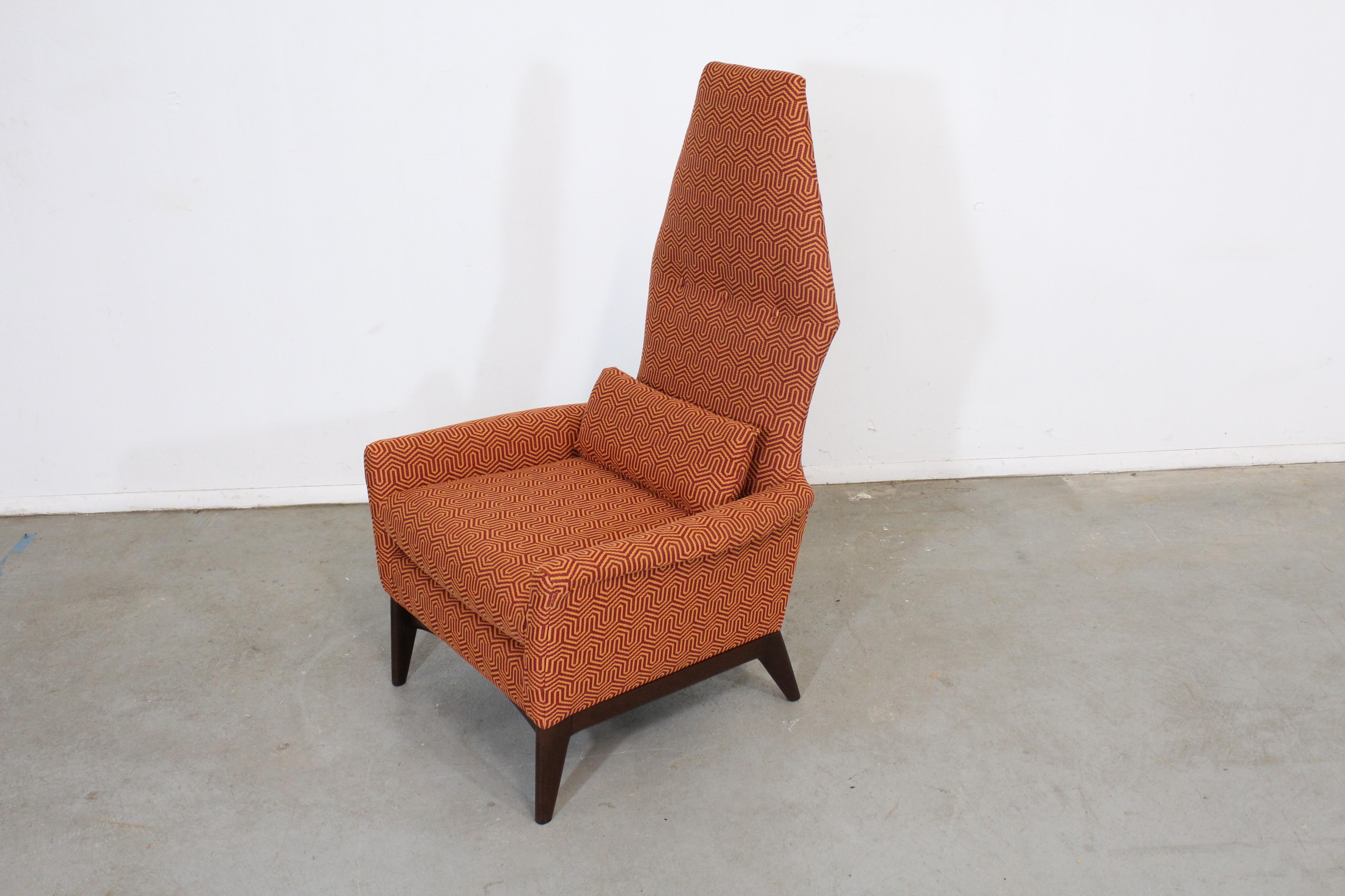Offered is a vintage sculptural lounge/accent chair, designed by Adrian Pearsall . Features a walnut base with uniquely sculpted arm, high back and new Crypton Mambo Jive fabric. This chair is truly unique and will make a wonderful addition to any