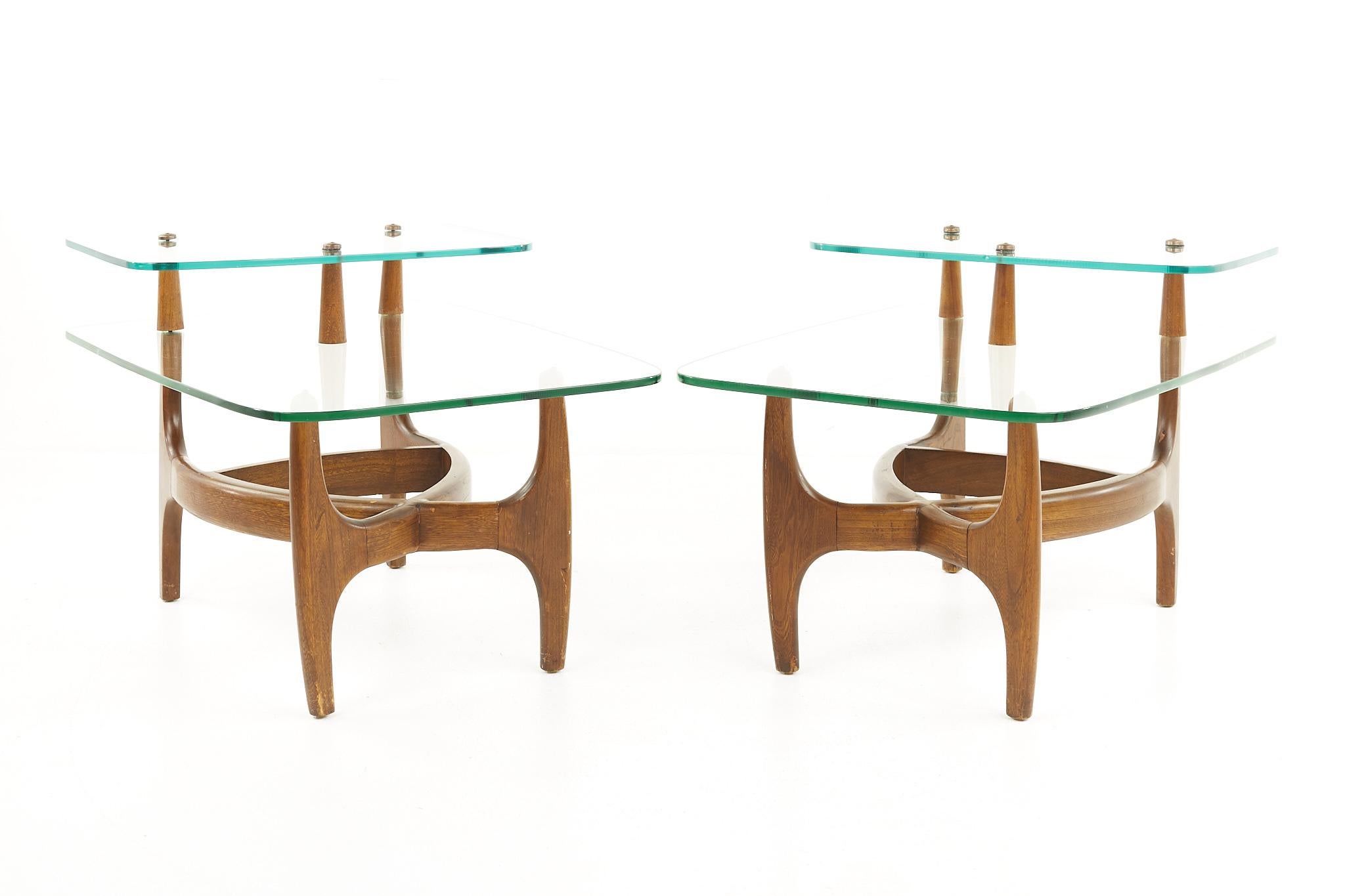 Adrian Pearsall Kroehler style mid century side tables - pair

Each table measures: 23 wide x 33 deep x 20 inches high

All pieces of furniture can be had in what we call restored vintage condition. That means the piece is restored upon purchase