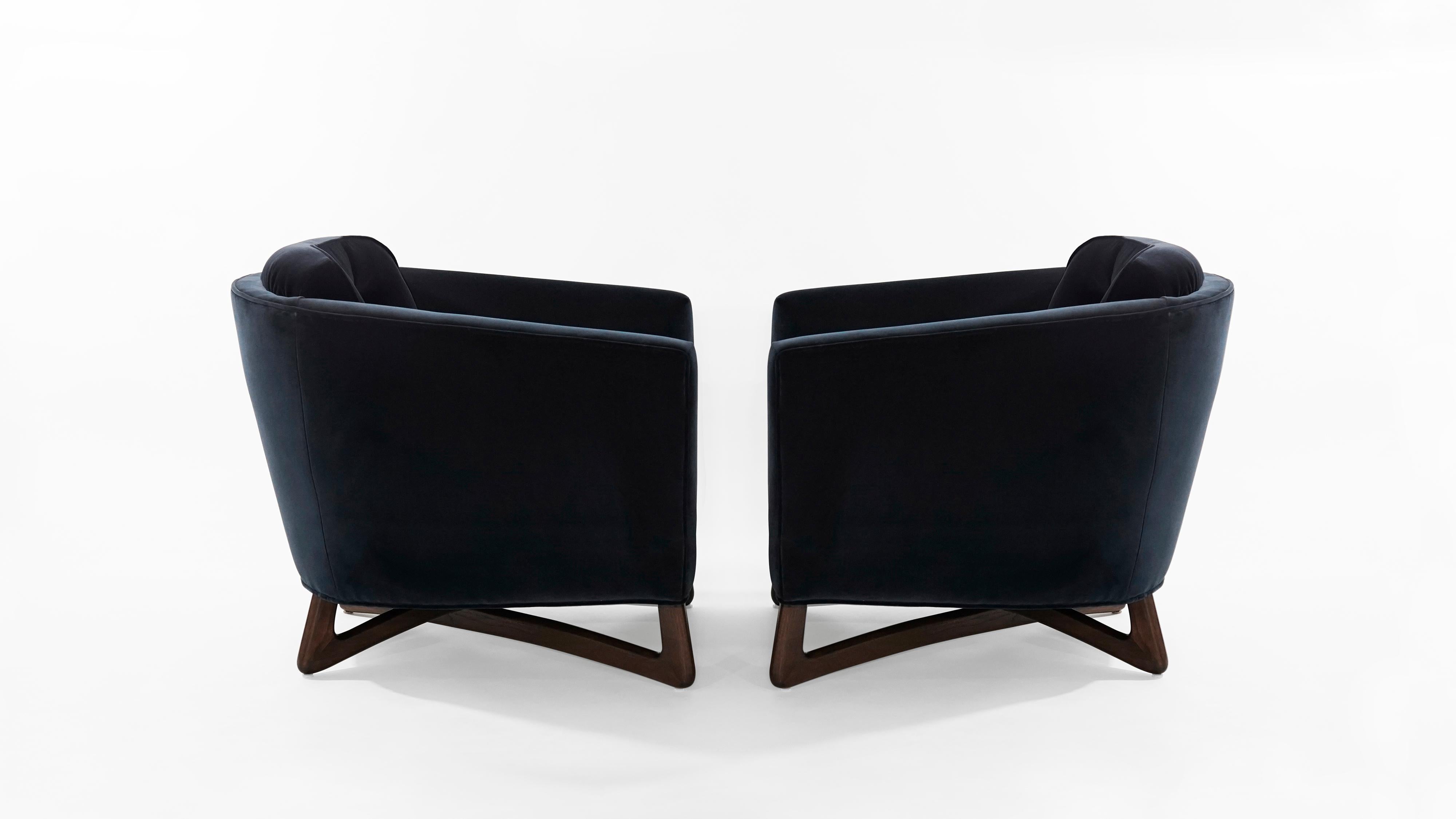 Set of lounge chairs designed by Adrian Pearsall for Craft Associates, circa 1950s.

Sculptural walnut bases fully restored, newly upholstered in great plains midnight velvet by Holly Hunt.