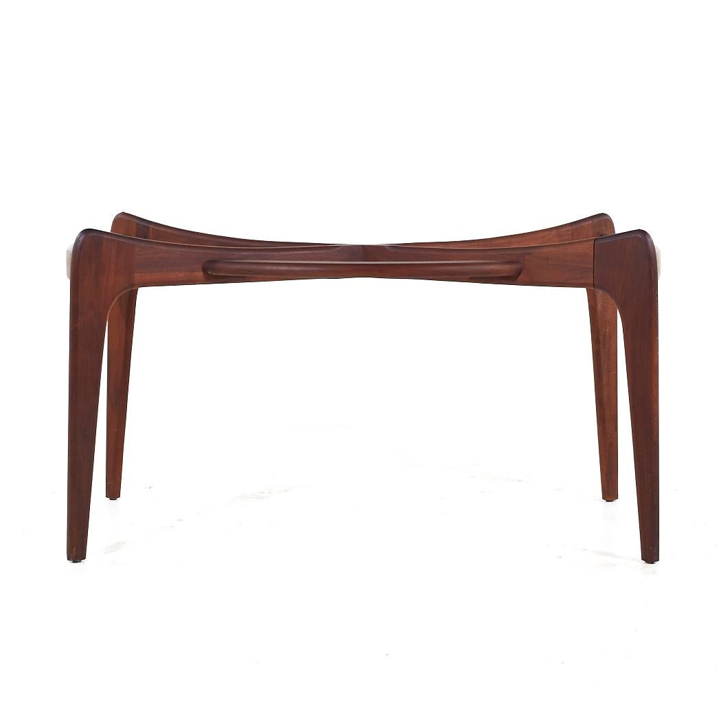 Adrian Pearsall Mid Century 2179-T Walnut Compass Dining Table

This dining table measures: 54 wide x 28.5 deep x 28.75 inches high, with a chair clearance of 24.25 inches

All pieces of furniture can be had in what we call restored vintage