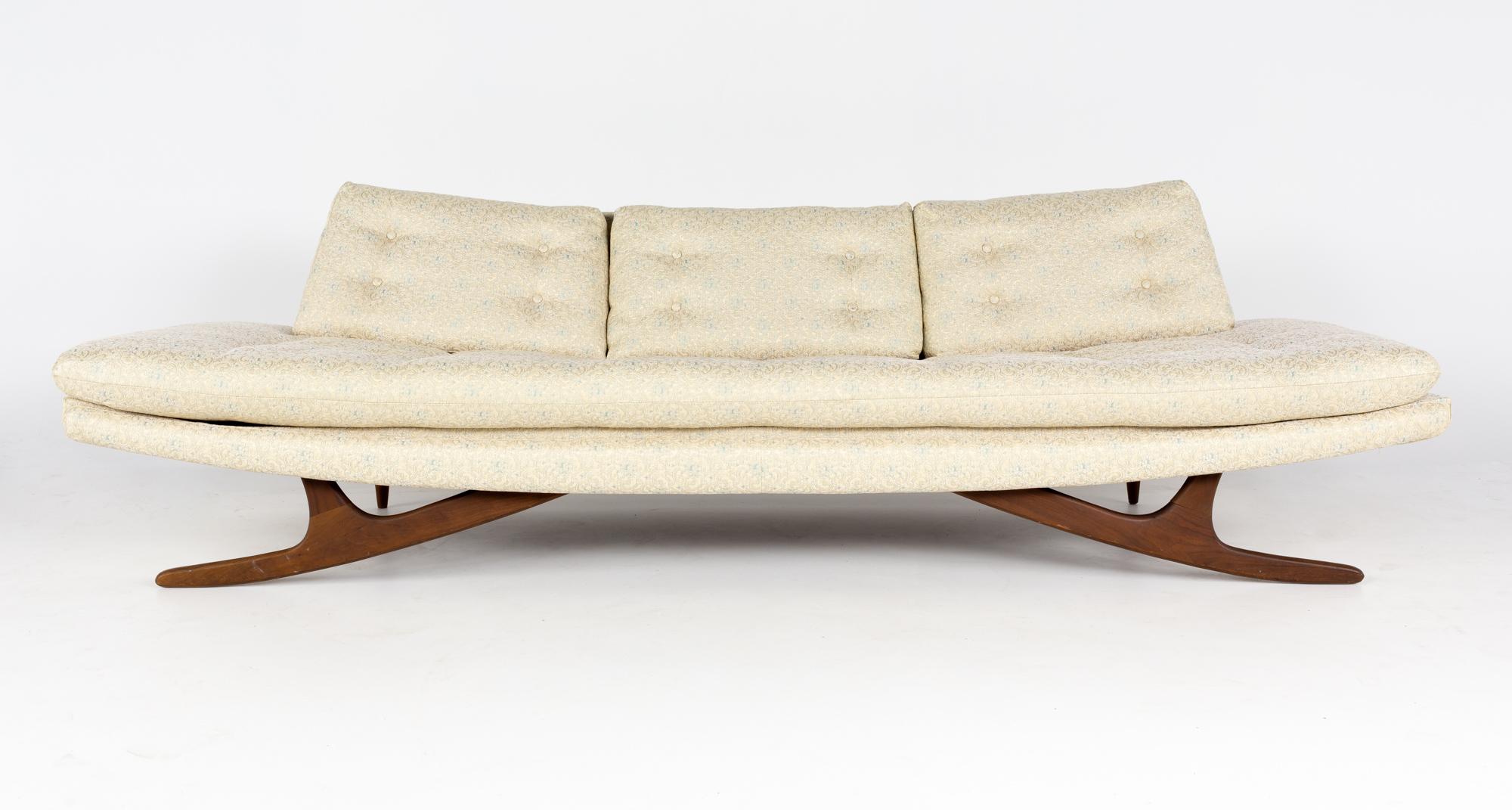 Adrian Pearsall mid century gondola sofa

This sofa measures: 104 wide x 34 deep x 31 inches high, with a seat height of 18.5 inches

All pieces of furniture can be had in what we call restored vintage condition. That means the piece is restored