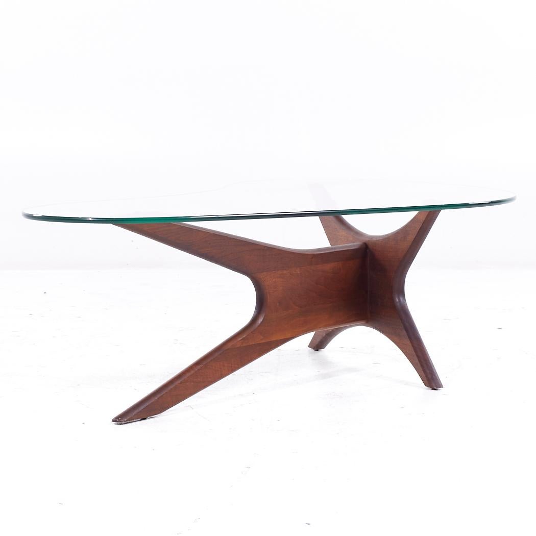 Adrian Pearsall Mid Century Jacks Walnut and Glass Biomorphic Coffee Table

This coffee table measures: 50.75 wide x 34 deep x 16 inches high

All pieces of furniture can be had in what we call restored vintage condition. That means the piece is