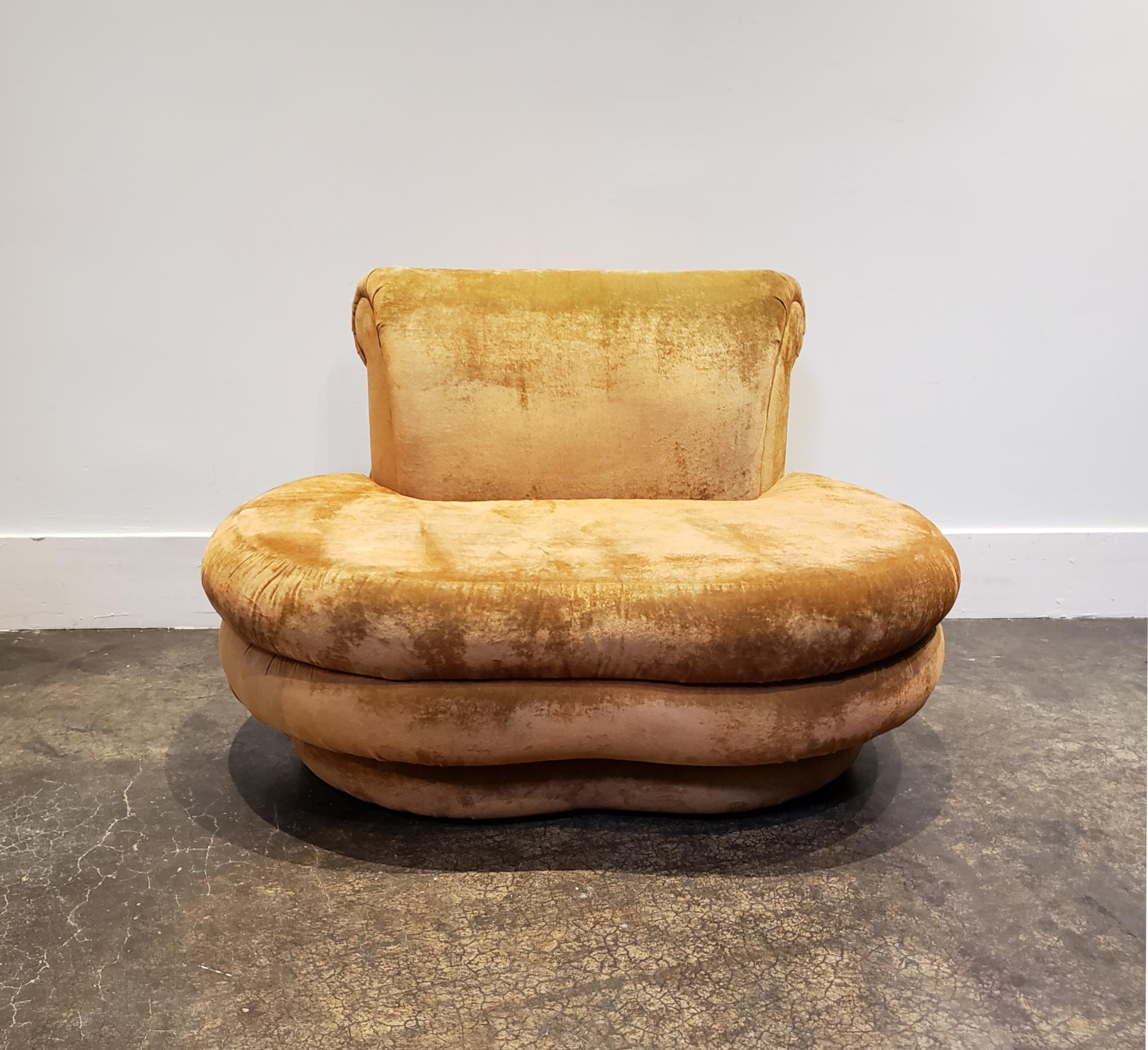 Fun cloud-like, kidney shaped sofa with stacked padded edges designed by Adrian Pearsall and manufactured by Comfort Designs in the 1980s. Fabric has been cleaned but still shows signs of wear and staining. Priced with re-upholstery in mind.
