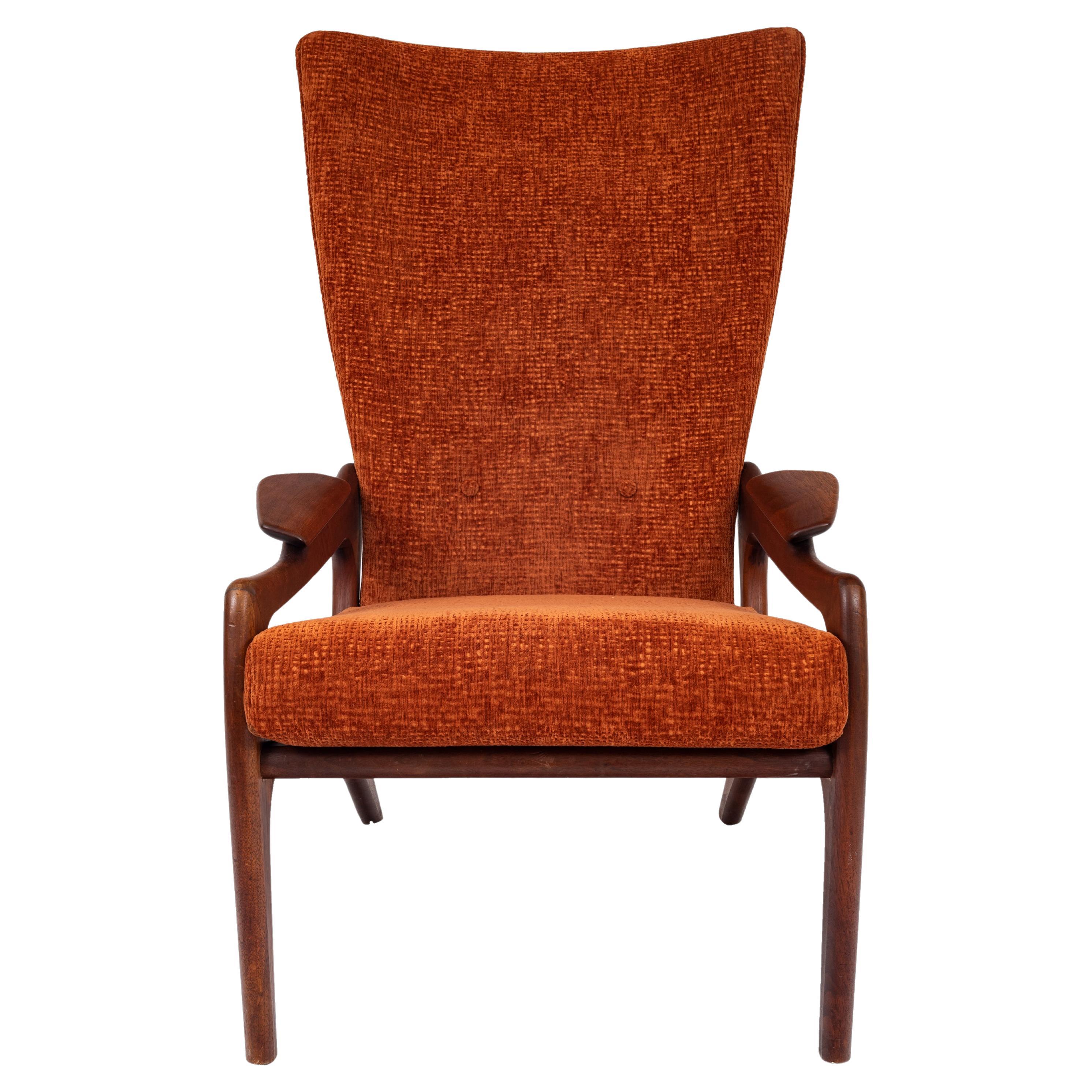 A good Adrian Pearsall Mid-Century Modern for Craft Associates highback lounge chair, 1960's.
The chair having a highback and walnut frame with a cutout design to the sides and raised armrests, the chair has just been professionally re-upholstered