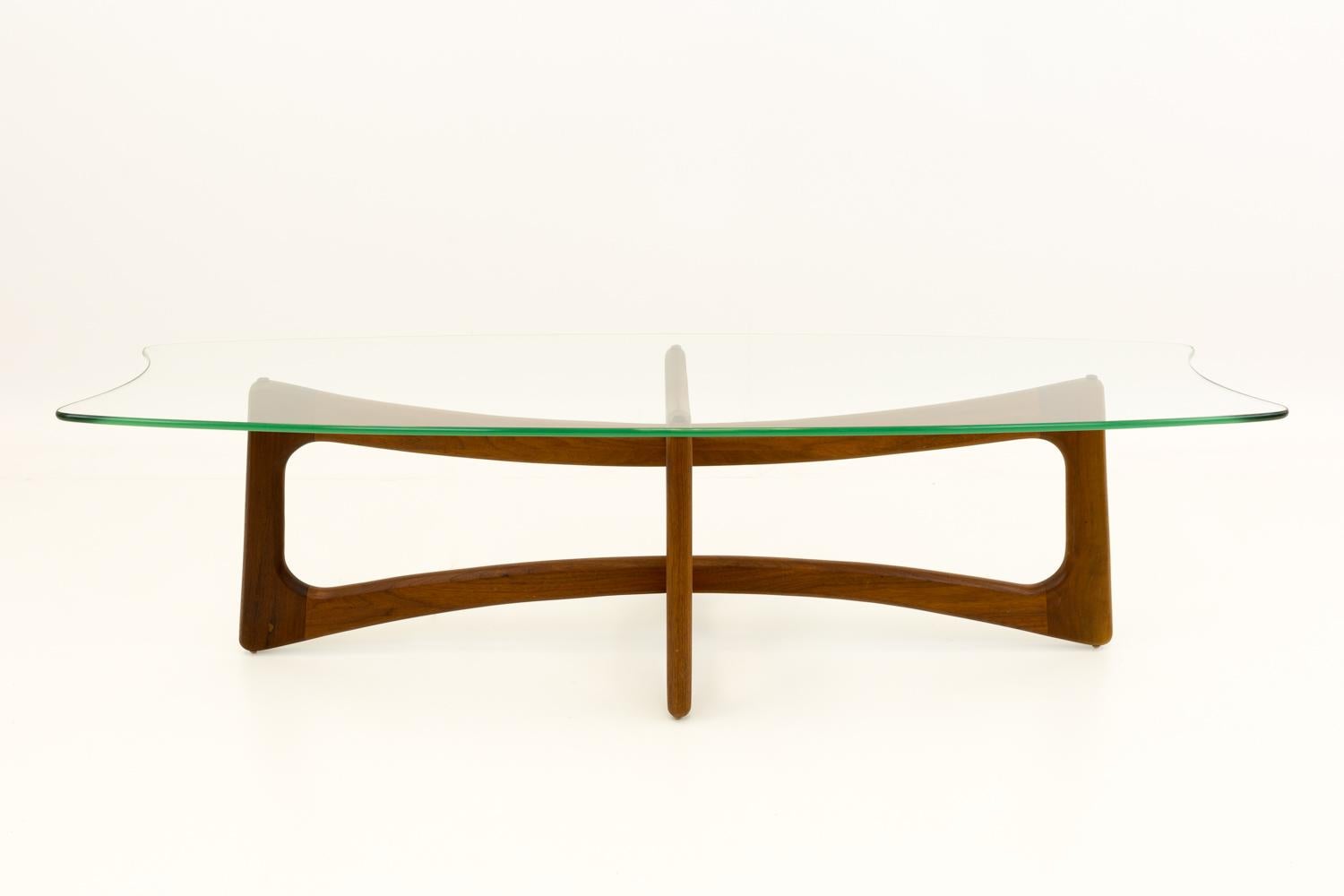 Adrian Pearsall mid century ribbon coffee table with stingray glass top
Coffee table measures: 59 wide x 20 deep x 16 inches high

?All pieces of furniture can be had in what we call restored vintage condition. That means the piece is restored