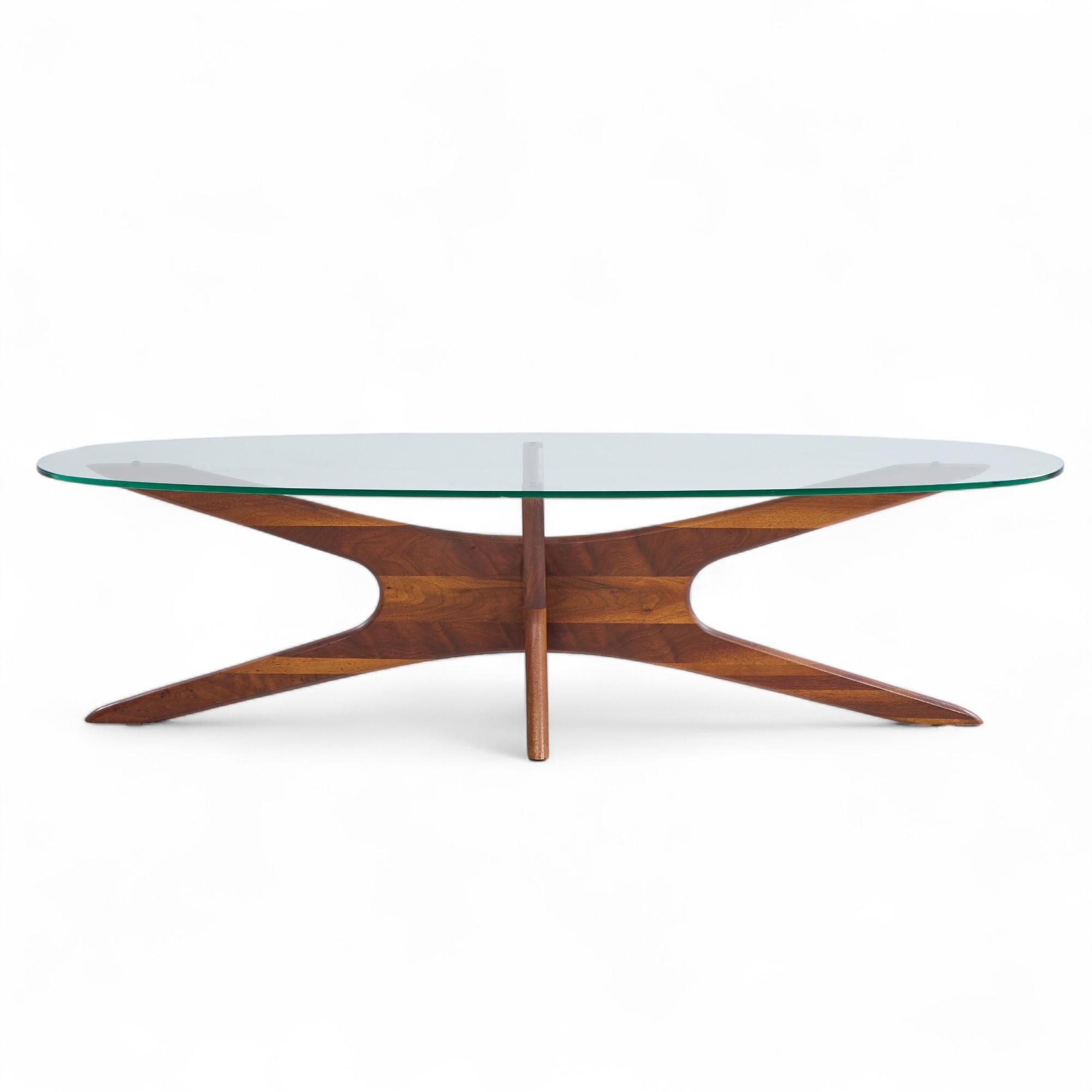 Adrian Pearsall Mid Century Walnut Jacks Coffee Table

This coffee table measures: 59 wide x 19.75 deep x 15.75 inches high

Excellent Vintage Condition.

We take our photos in a controlled lighting studio to show as much detail as possible. We do
