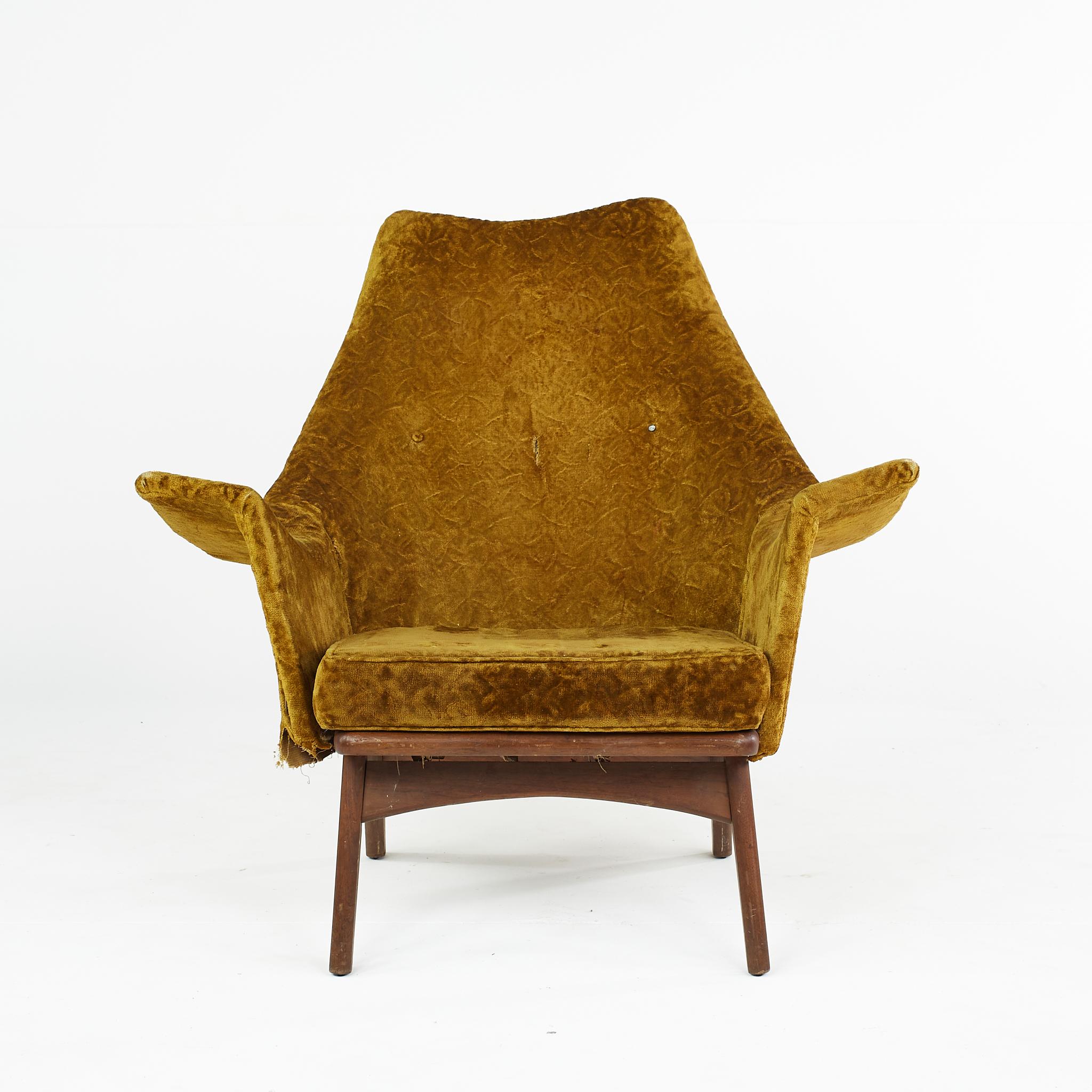 Adrian Pearsall mid century walnut wingback arm chair

This chair measures: 38 wide x 44 deep x 39 inches high, with a seat height of 16 and an arm height of 26 inches

Ready for new upholstery. This service is available for an additional