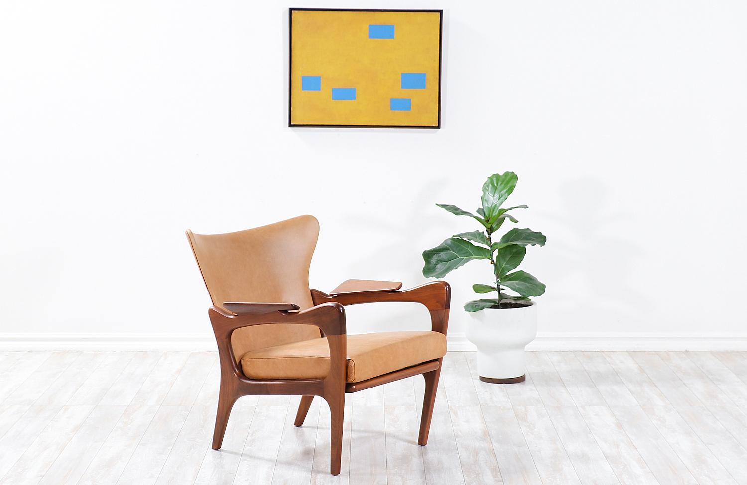 An impressive chair designed by architect Adrian Pearsall in collaboration with the manufacturing company, Craft Associates, Inc. who operated in Wilkes-Barre, Pennsylvania in the 1960s. This rare wingback chair, also known as the Model 2291-C