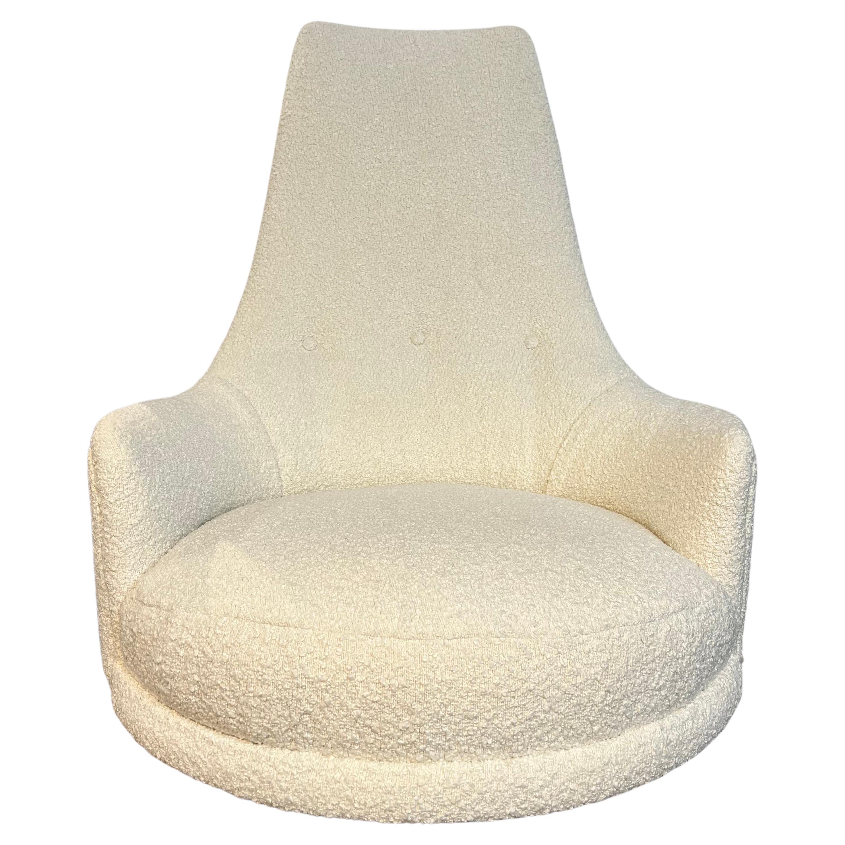 Gorgeous newly upholstered in elegant ivory boucle fabric high back swivel chair.
Designed by Adrian Pearsall for Craft Associates in PA circa 1960's. Why not own the best.